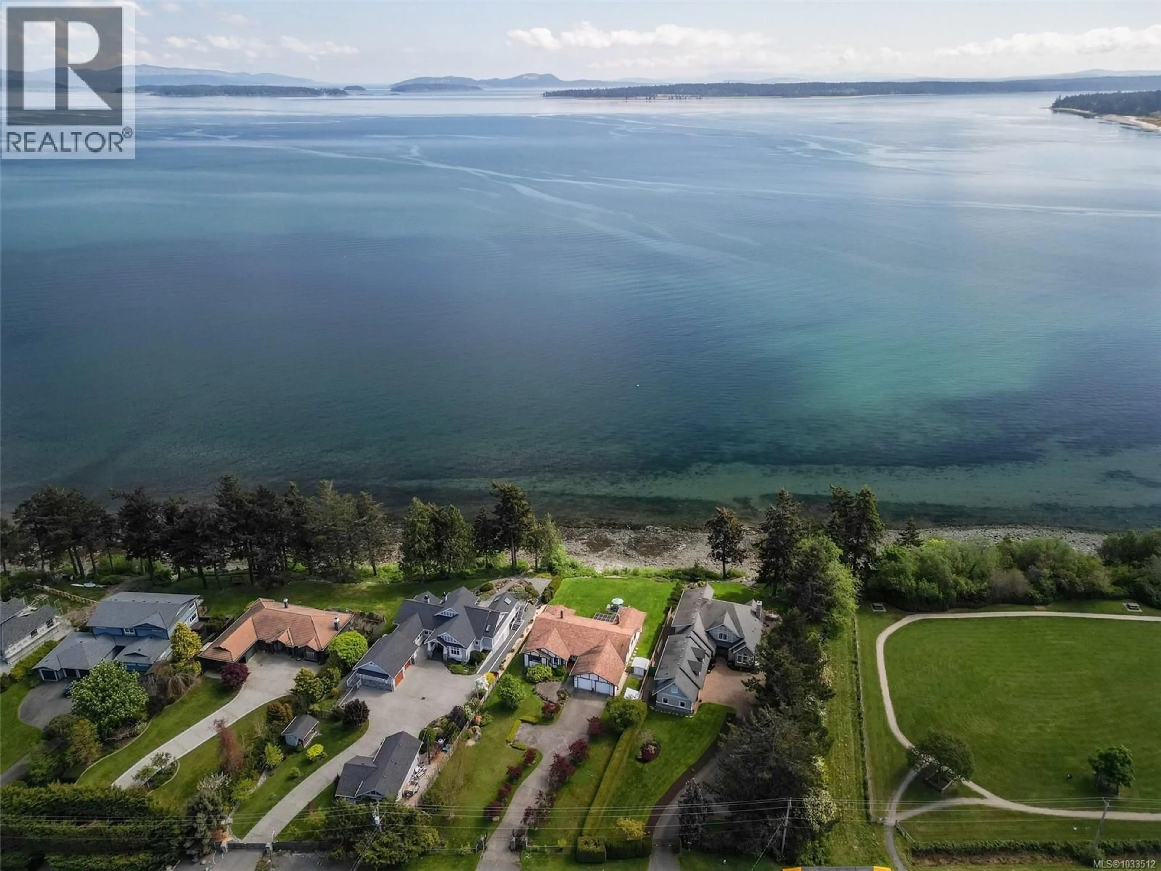 A pic from outside/outdoor area/front of a property/back of a property/a pic from drone, water/lake/river/ocean view for 8877 LOCHSIDE DRIVE, North Saanich British Columbia V8L1N1