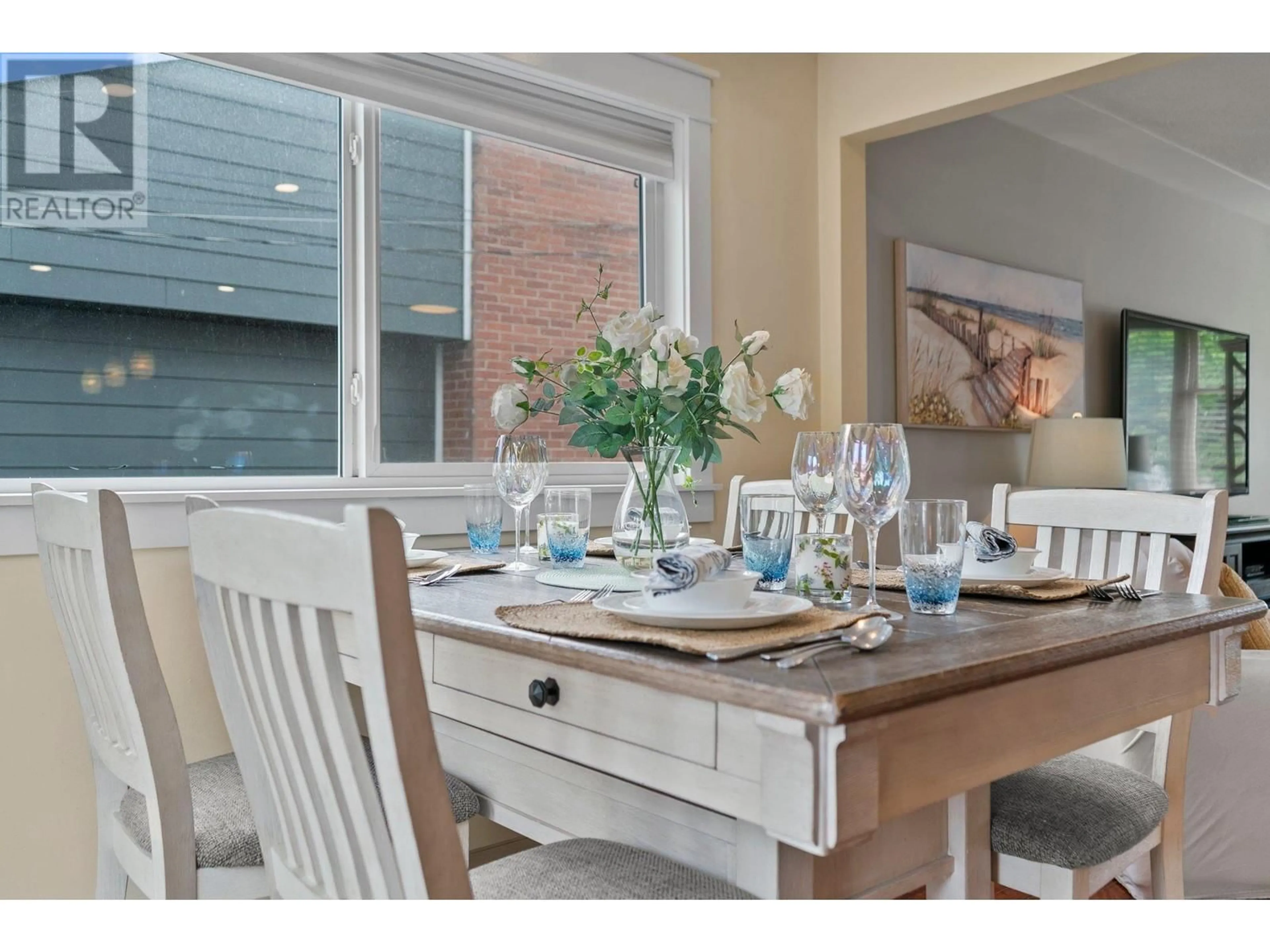 Dining room, wood/laminate floor for 845 Richter Street, Kelowna British Columbia V1Y2J9