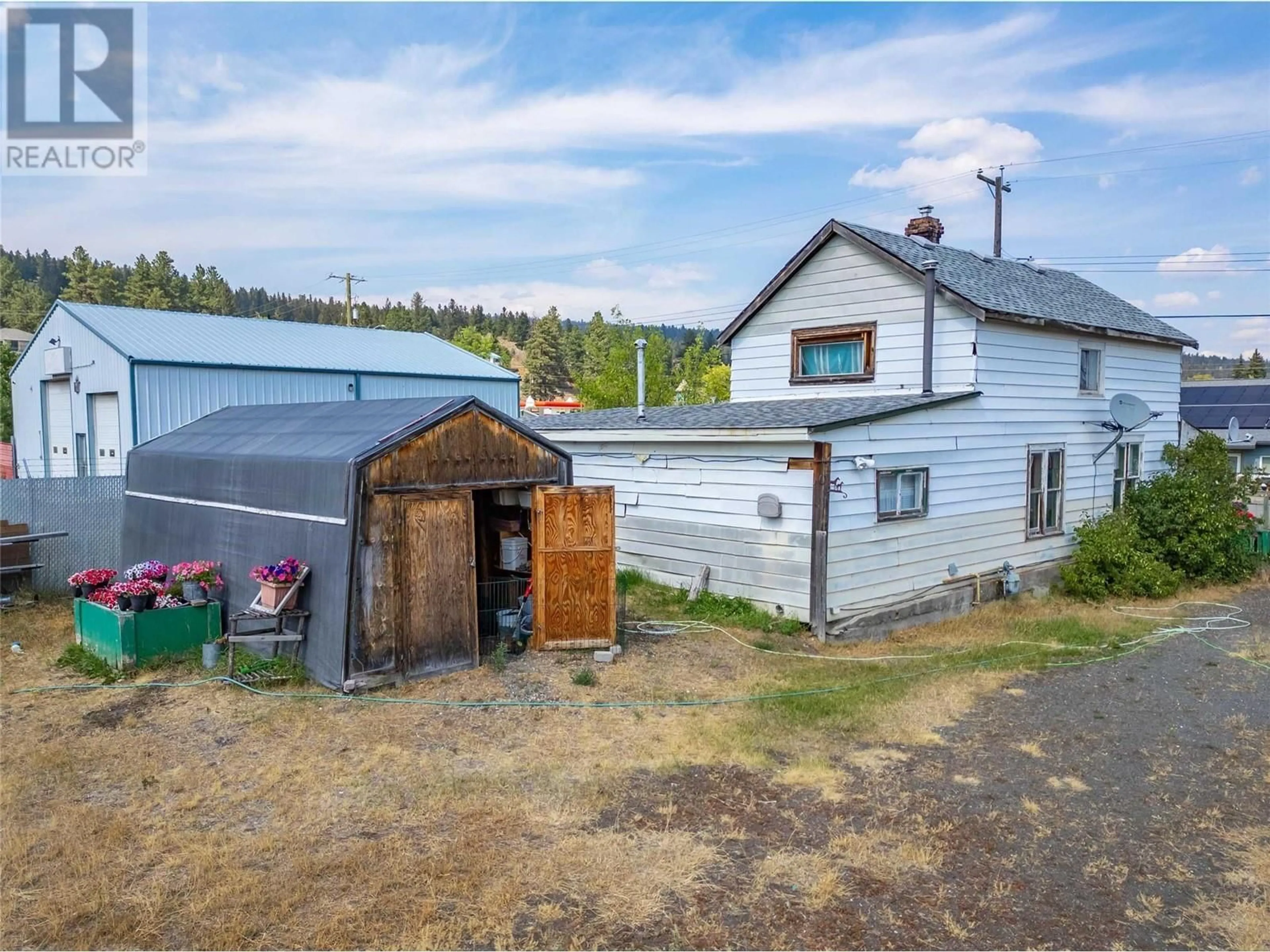 A pic from outside/outdoor area/front of a property/back of a property/a pic from drone, unknown for 307 SMITH AVENUE, Clinton British Columbia V0K1K0