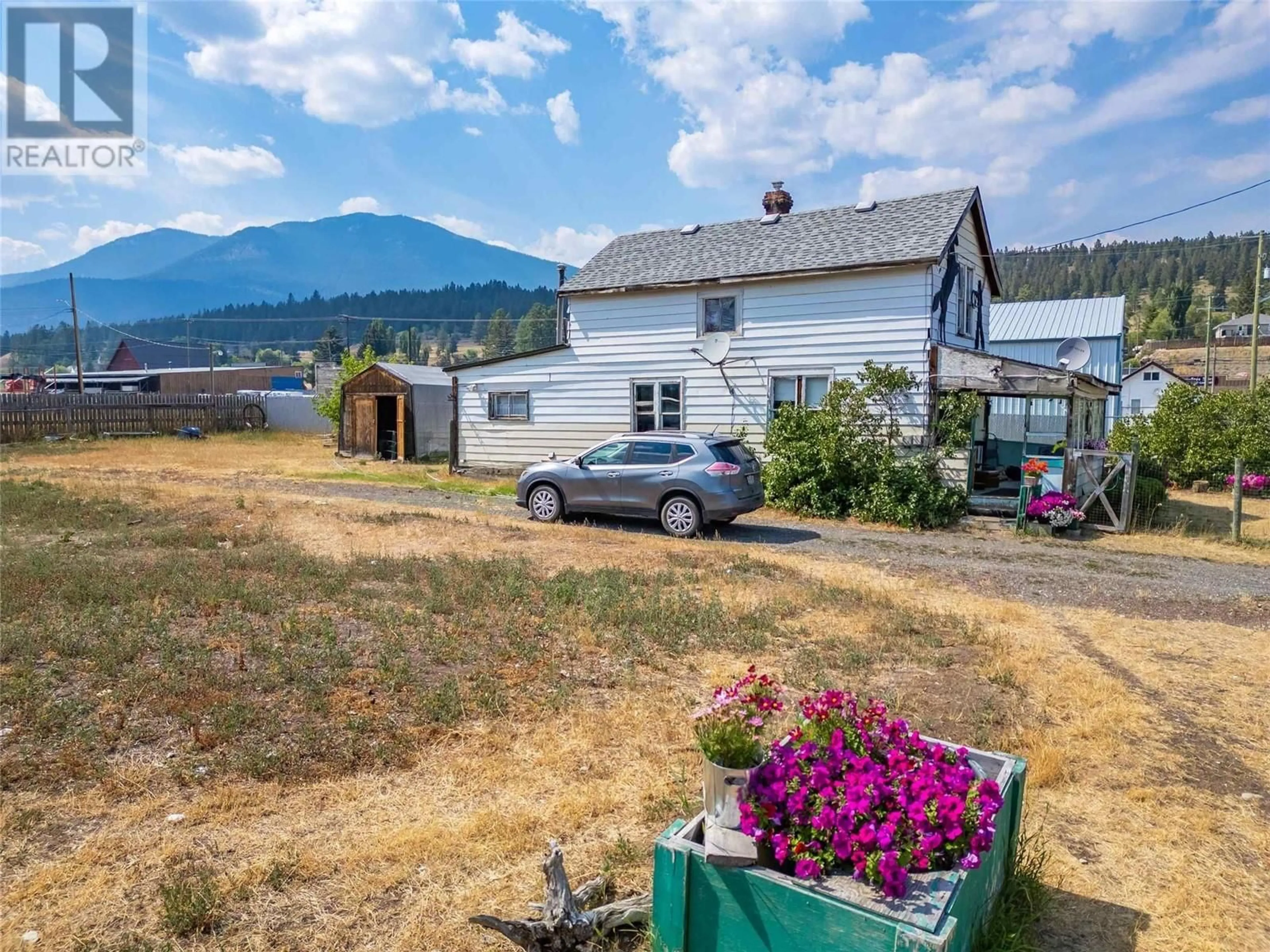 A pic from outside/outdoor area/front of a property/back of a property/a pic from drone, mountain view for 307 Smith Avenue, Clinton British Columbia V0K1K0