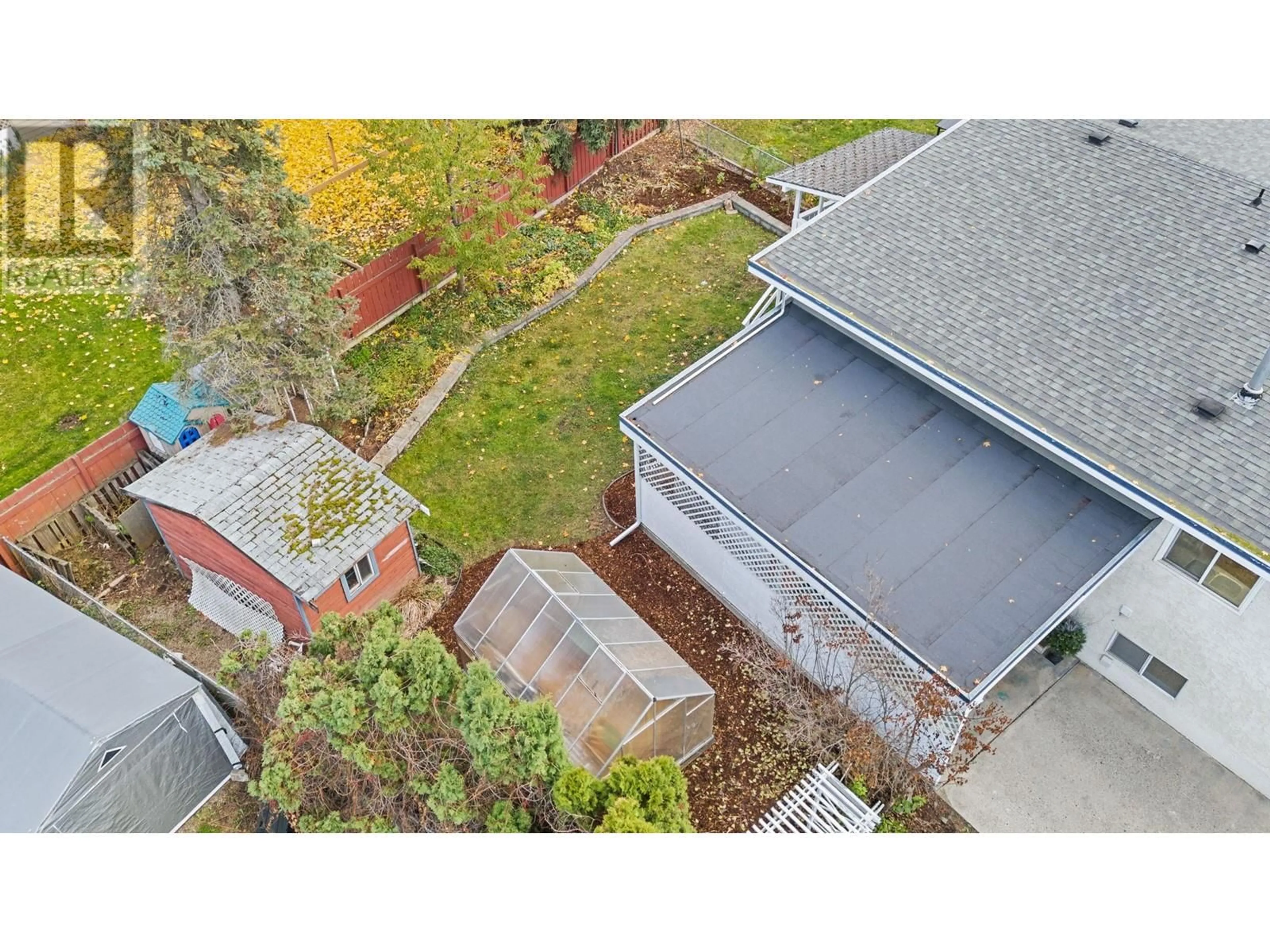 A pic from outside/outdoor area/front of a property/back of a property/a pic from drone, street for 1350 Maple Road, Kelowna British Columbia V1X4Y4