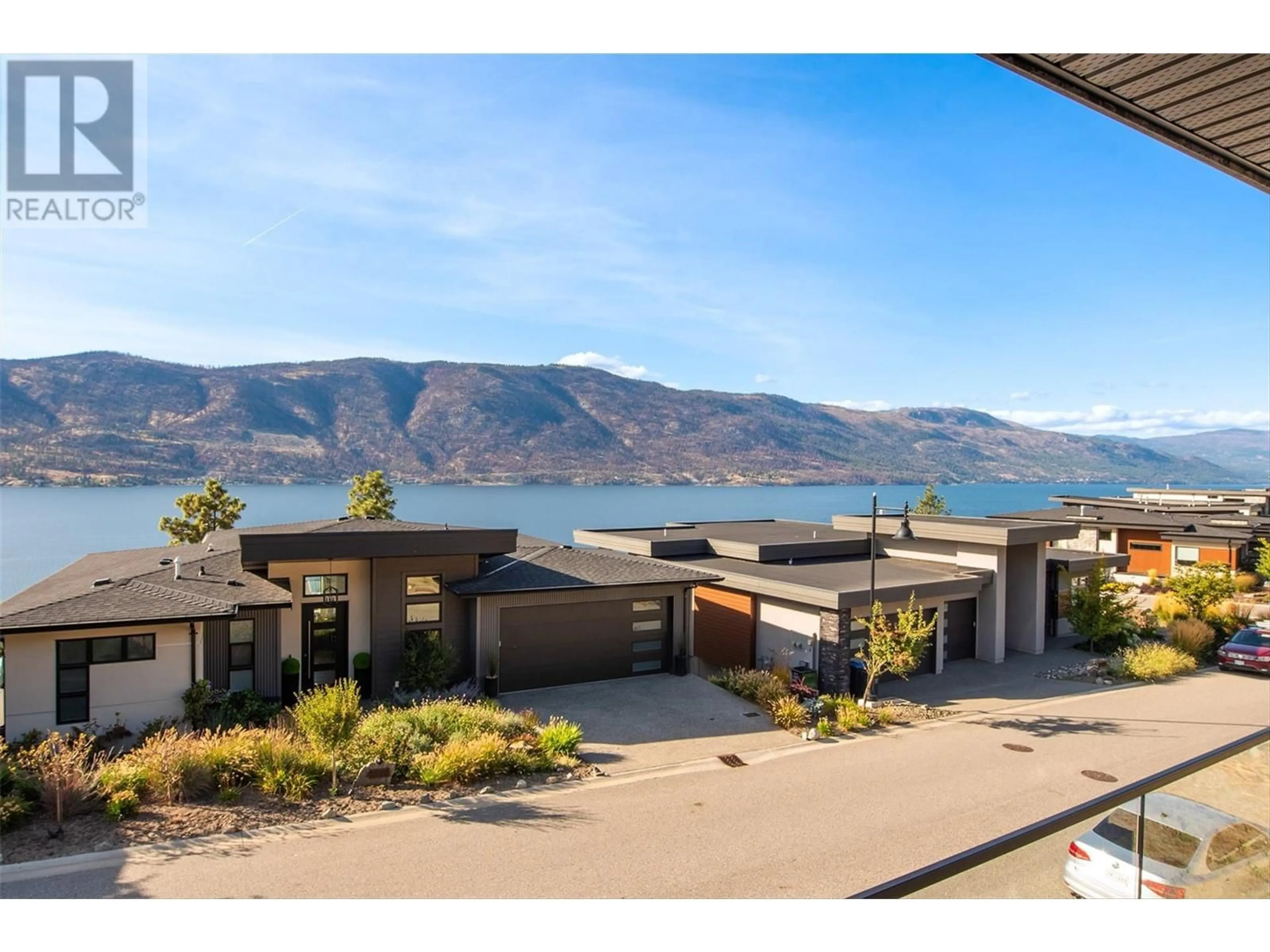 A pic from outside/outdoor area/front of a property/back of a property/a pic from drone, water/lake/river/ocean view for 3565 Boxwood Road, Kelowna British Columbia V1V3G2