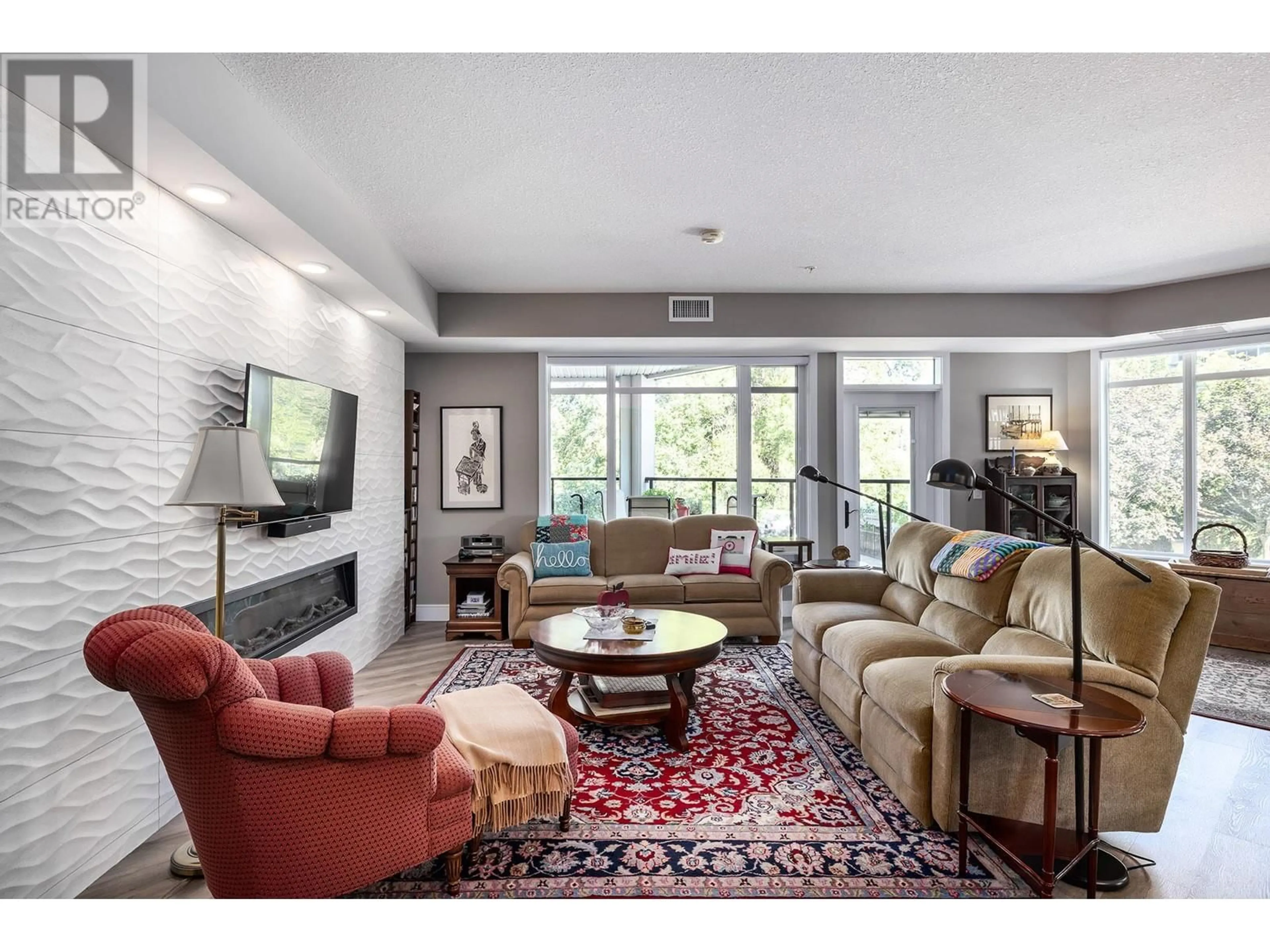 Living room with furniture, unknown for 202 - 529 TRUSWELL ROAD, Kelowna British Columbia V1W3K7