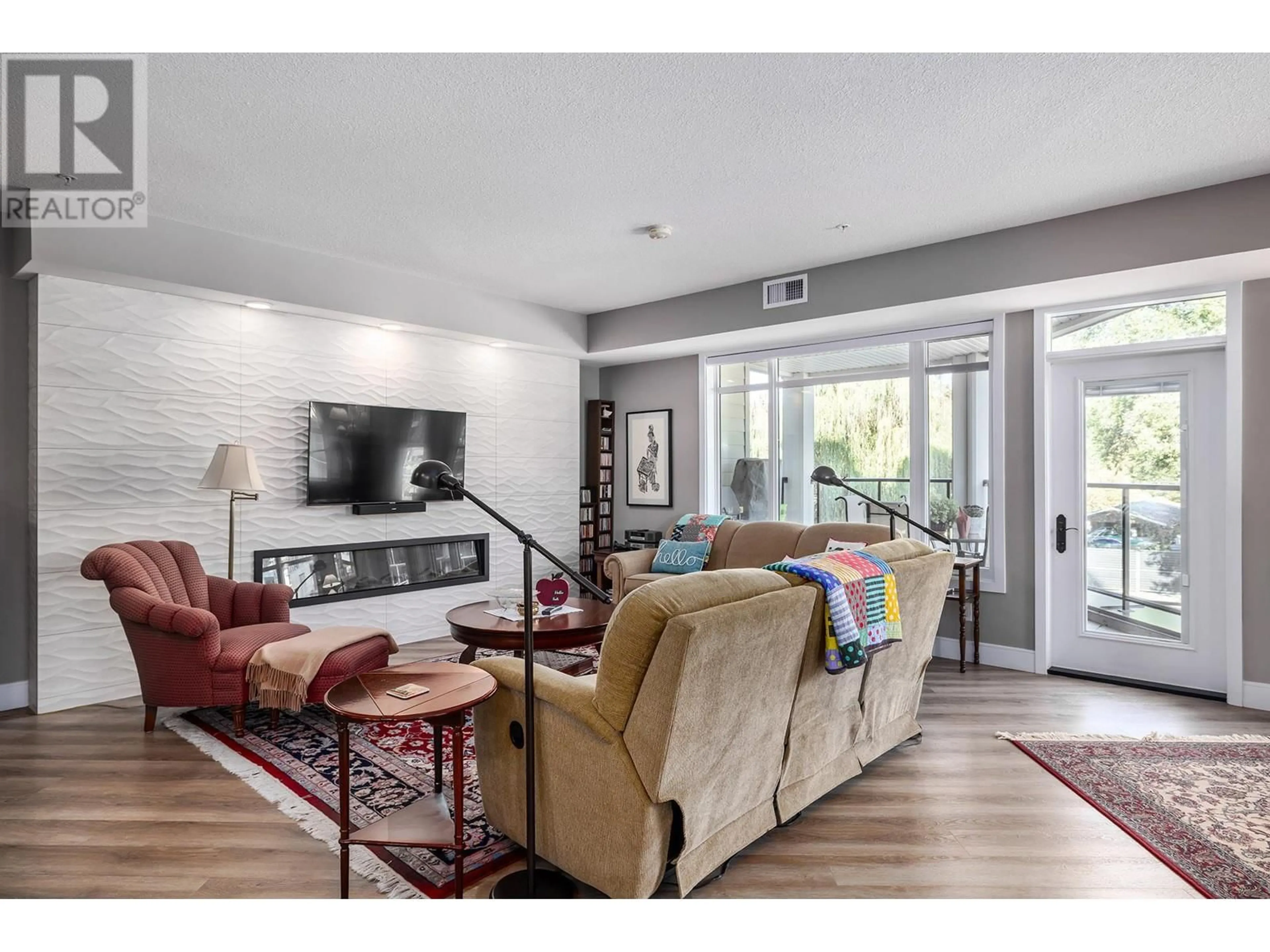 Living room with furniture, unknown for 202 - 529 TRUSWELL ROAD, Kelowna British Columbia V1W3K7