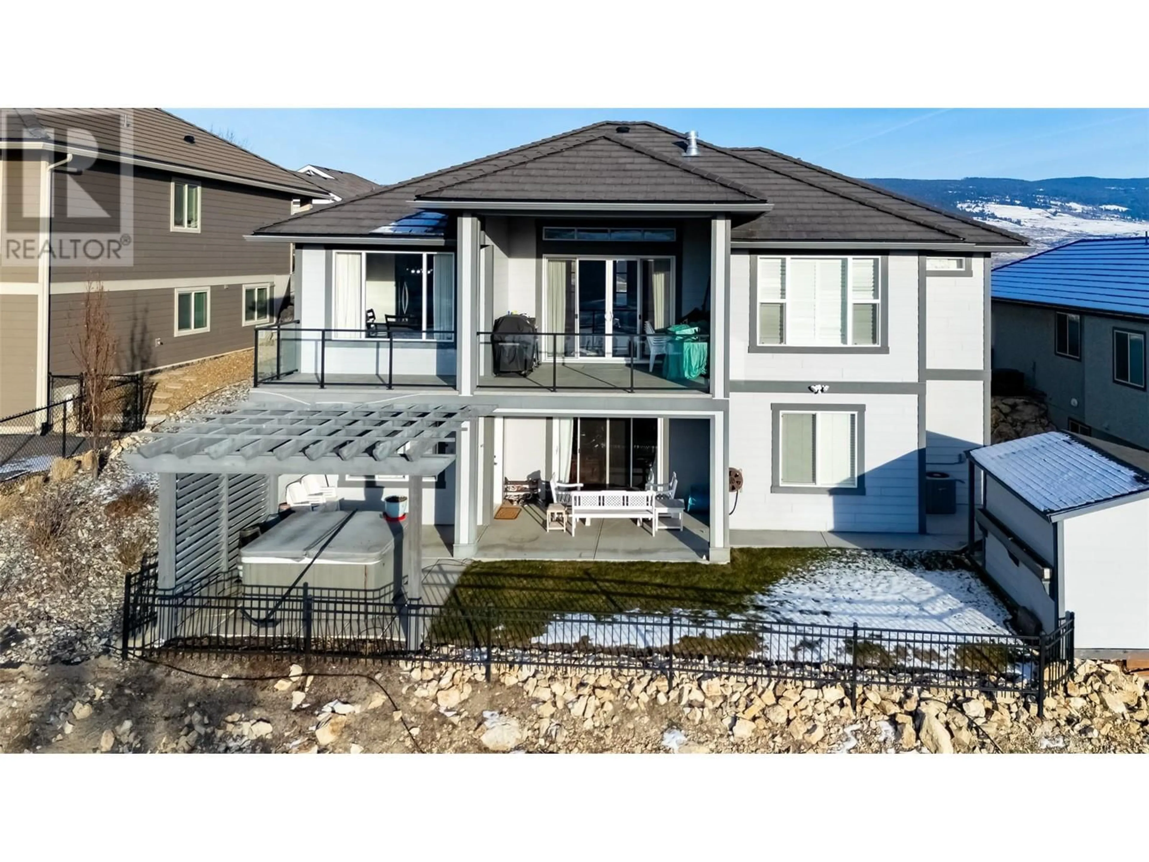 A pic from outside/outdoor area/front of a property/back of a property/a pic from drone, unknown for 1750 Capistrano Peaks Crescent, Kelowna British Columbia V1V2Z3