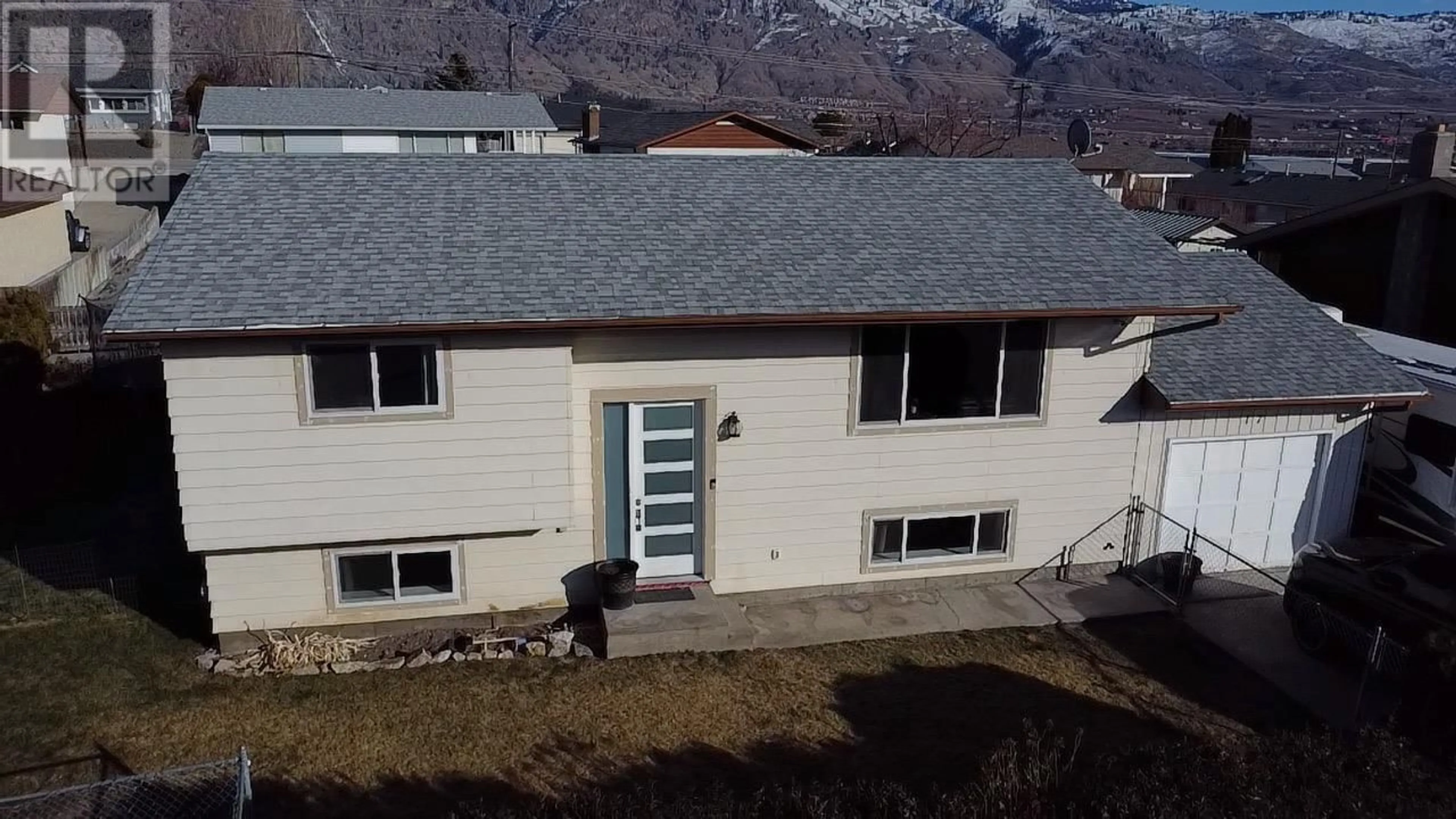 A pic from outside/outdoor area/front of a property/back of a property/a pic from drone, mountain view for 17 SANTA ROSA Place, Osoyoos British Columbia V0H1V2