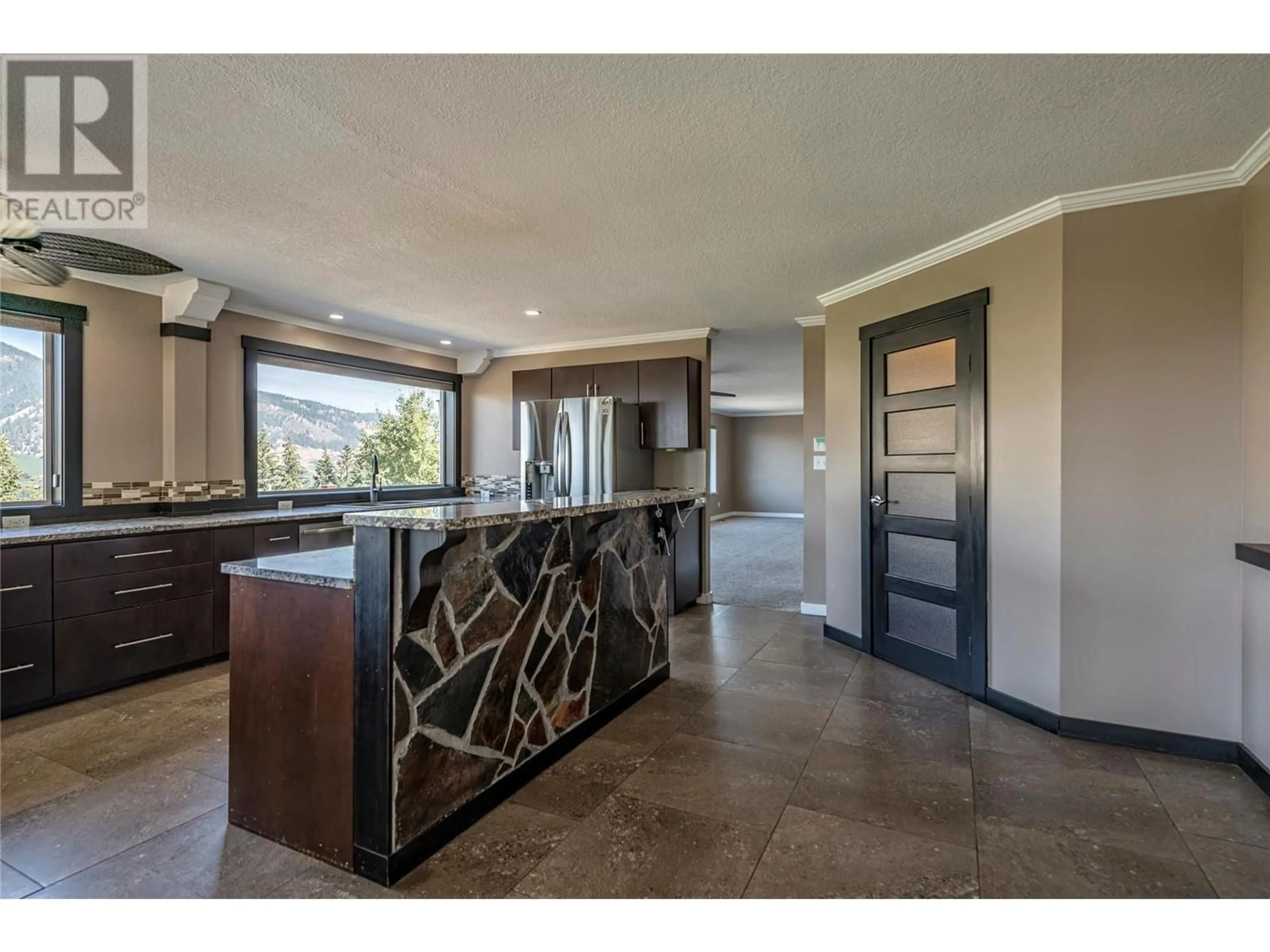 Open concept kitchen, ceramic/tile floor for 6660 BREWER ROAD, Coldstream British Columbia V1B3H2
