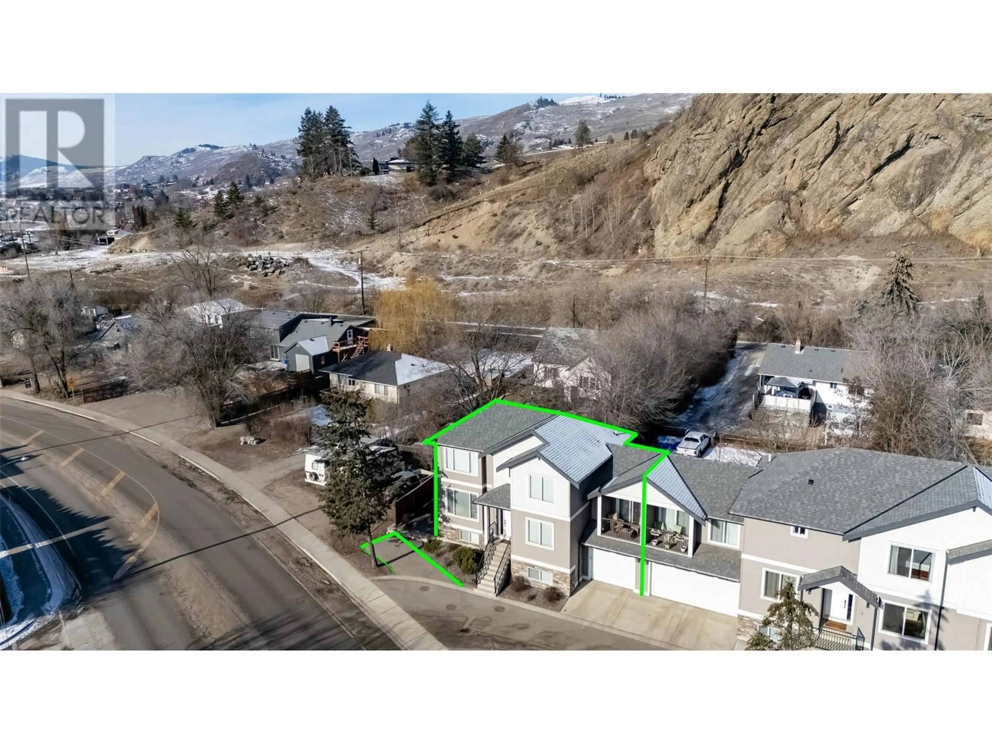 A pic from outside/outdoor area/front of a property/back of a property/a pic from drone, mountain view for 3909 30th Avenue Unit# 1, Vernon British Columbia V1T2G2