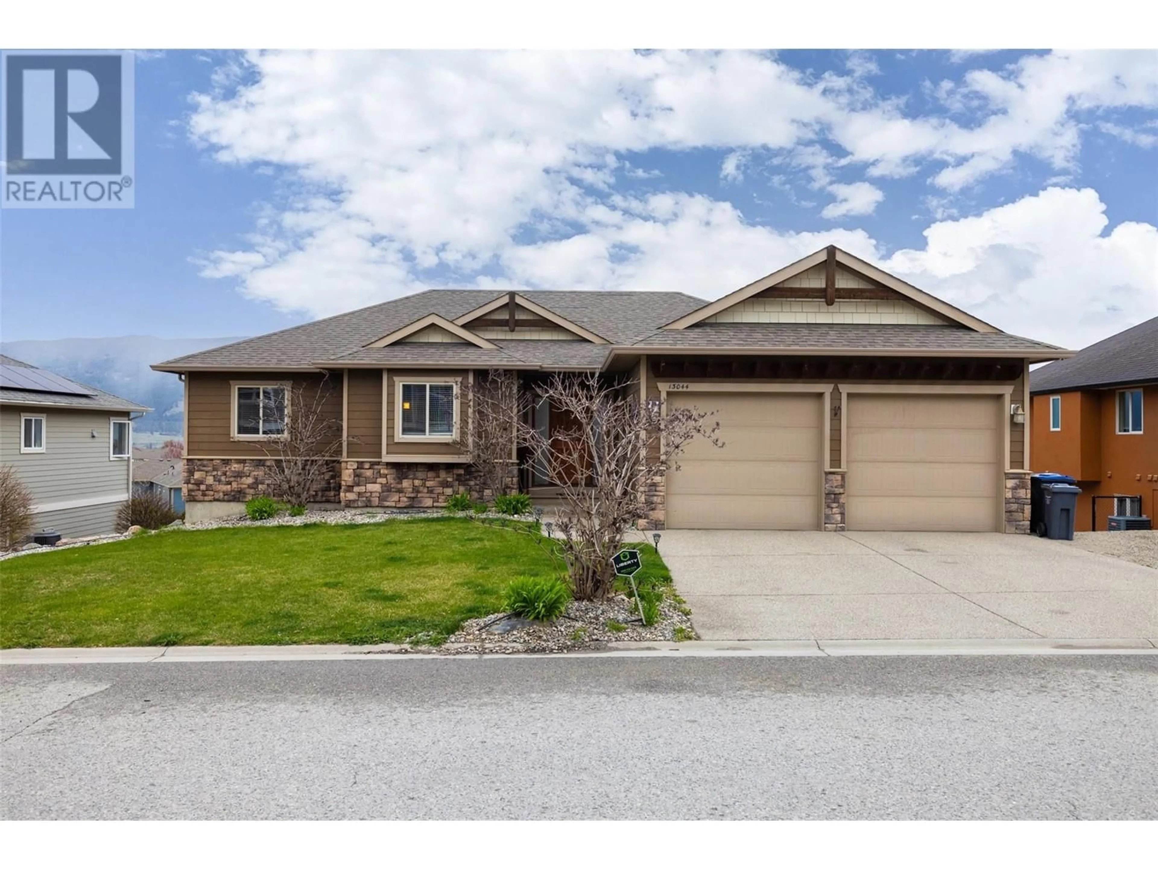 Home with vinyl exterior material, street for 13044 LAKE HILL DRIVE, Lake Country British Columbia V4V2P1