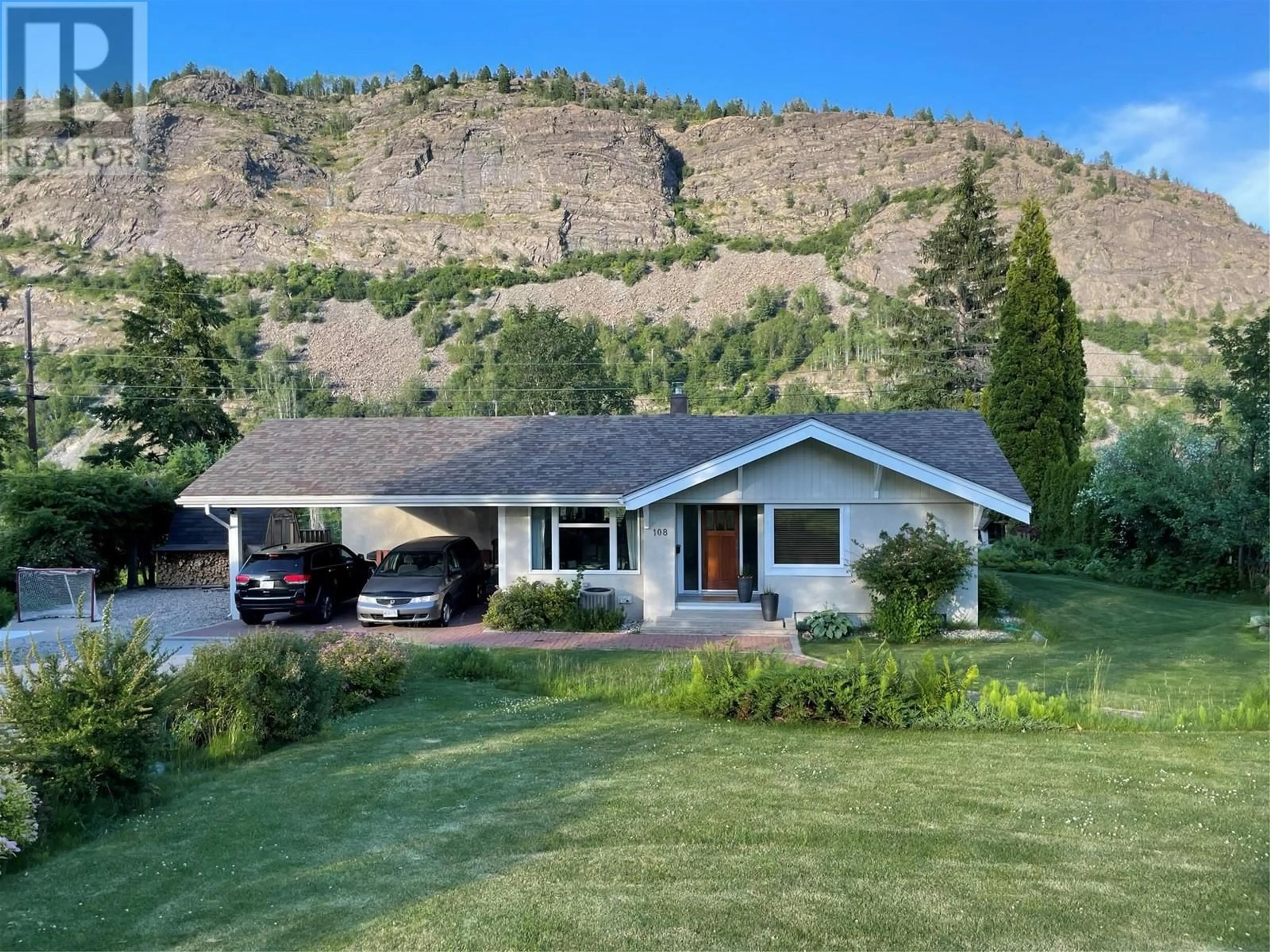 A pic from outside/outdoor area/front of a property/back of a property/a pic from drone, mountain view for 108 Ritchie Avenue, Trail British Columbia V1R1G9