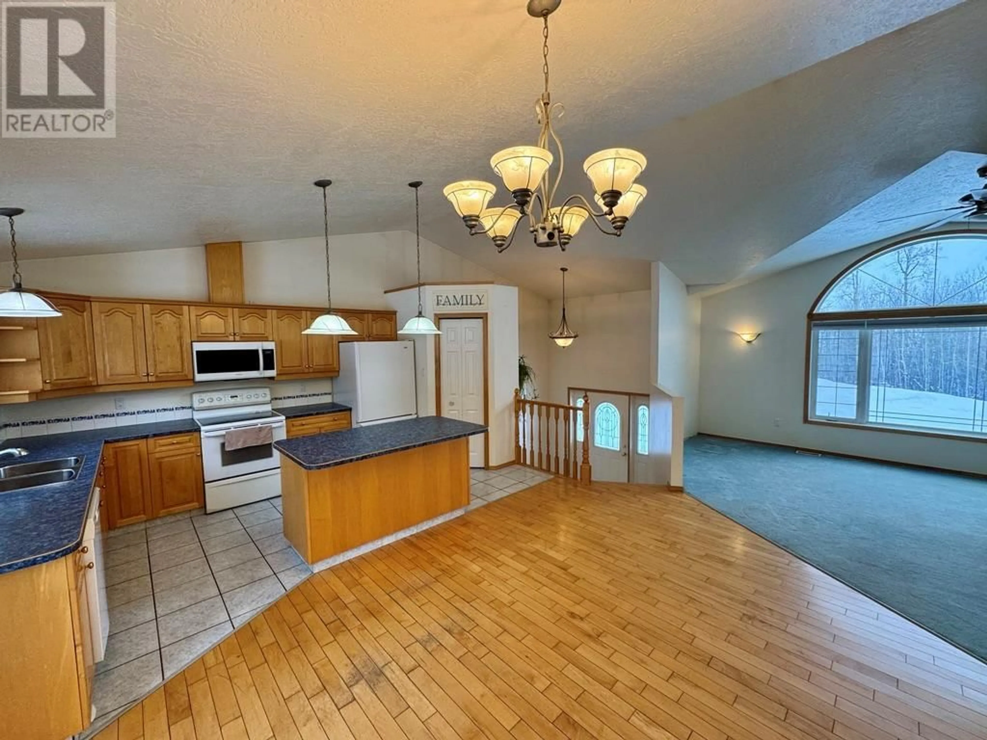 Open concept kitchen, unknown for 203 Briar Meadows Subdivision, Dawson Creek British Columbia V1G4E8