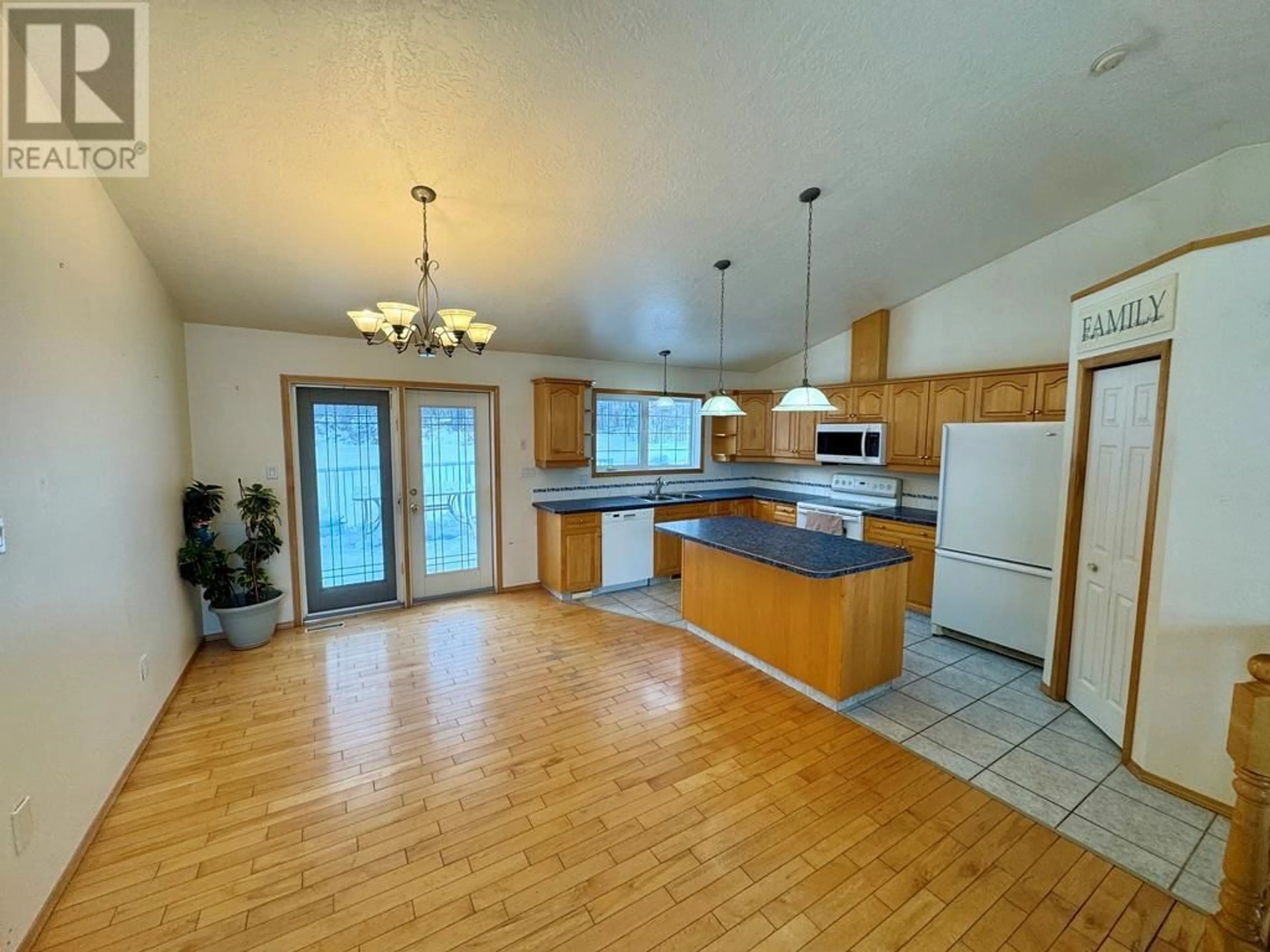 Open concept kitchen, unknown for 203 Briar Meadows Subdivision, Dawson Creek British Columbia V1G4E8