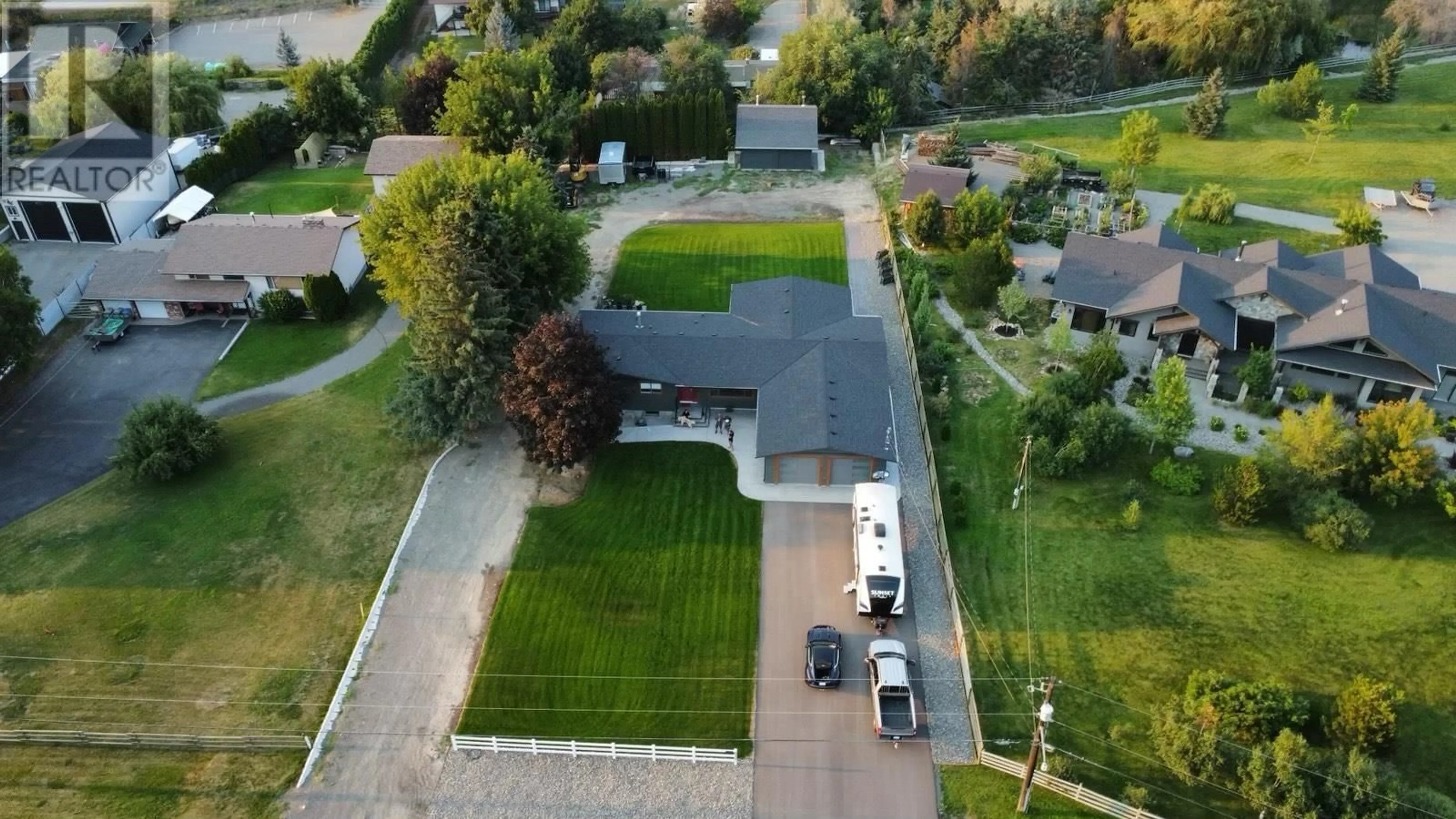 A pic from outside/outdoor area/front of a property/back of a property/a pic from drone, street for 6396 Meadowland Crescent N, Kamloops British Columbia V2C5J1