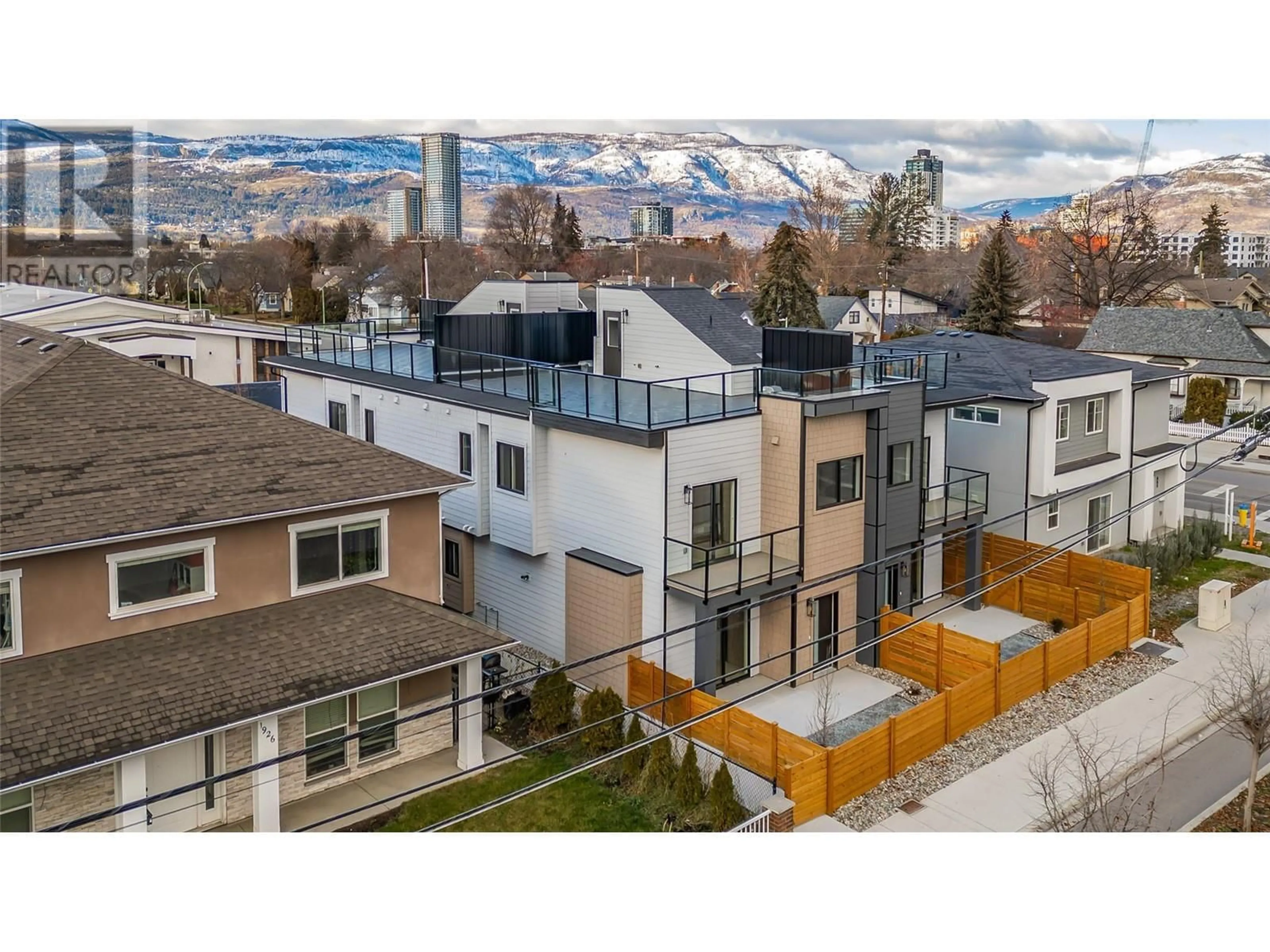 A pic from outside/outdoor area/front of a property/back of a property/a pic from drone, mountain view for 1916 Ethel Street Unit# 2, Kelowna British Columbia V1Y2Z5