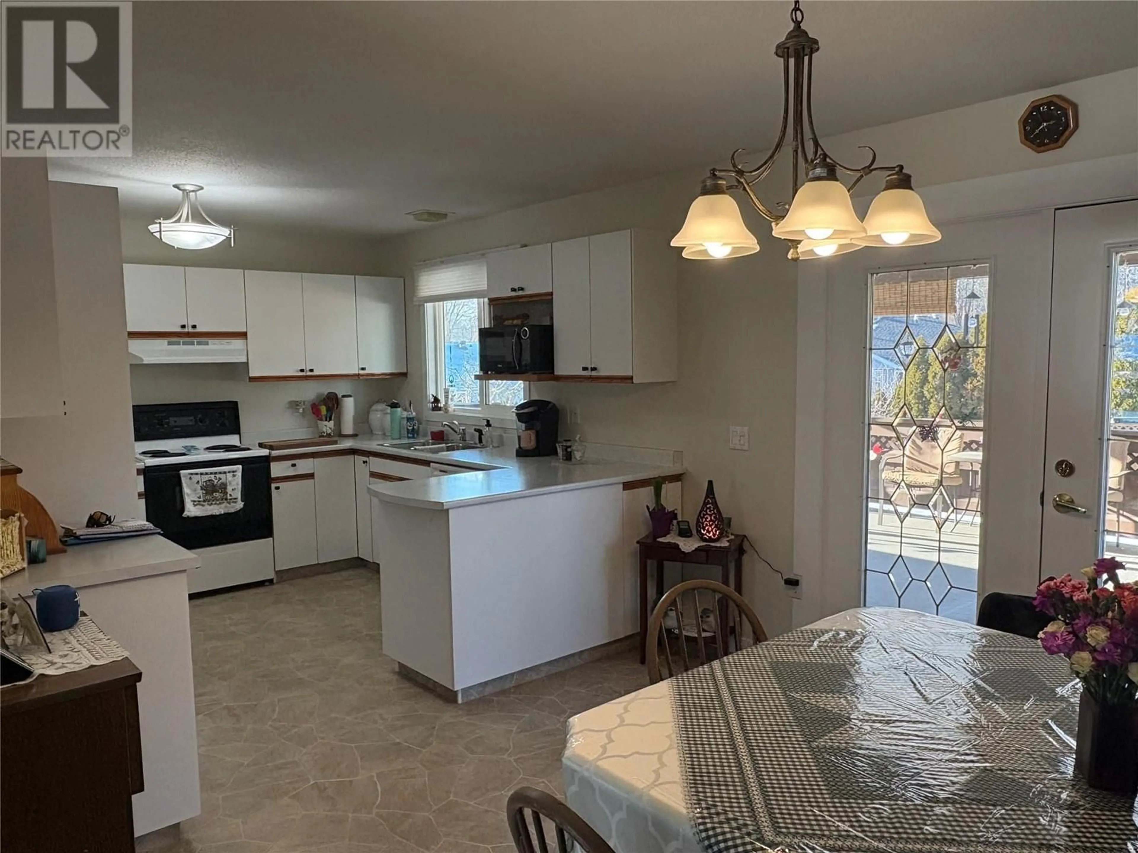 Open concept kitchen, ceramic/tile floor for 616 Third Avenue, Chase British Columbia V0E1M0