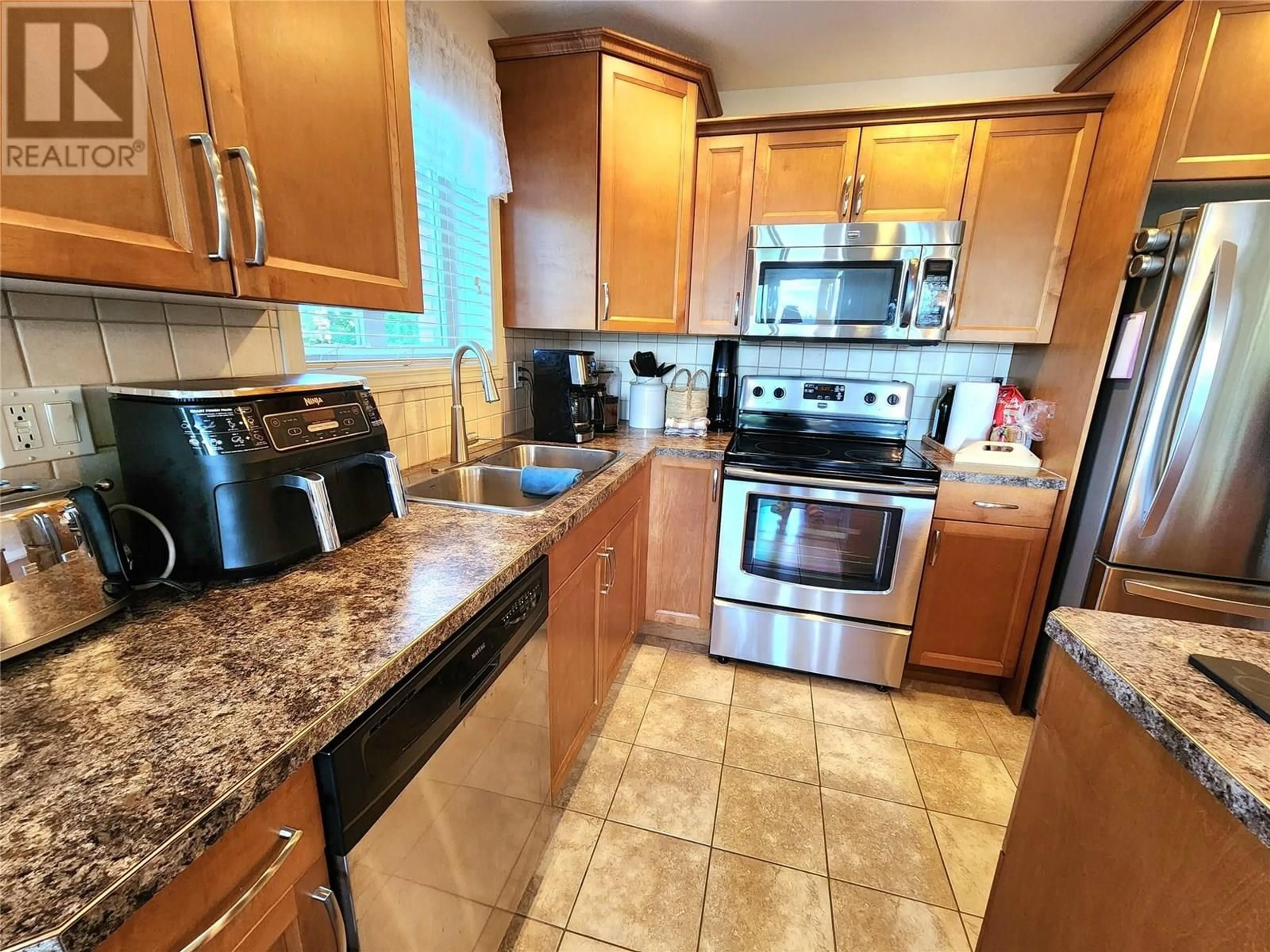 Standard kitchen, ceramic/tile floor for 302 - 2125 ATKINSON STREET, Penticton British Columbia V2A9E6