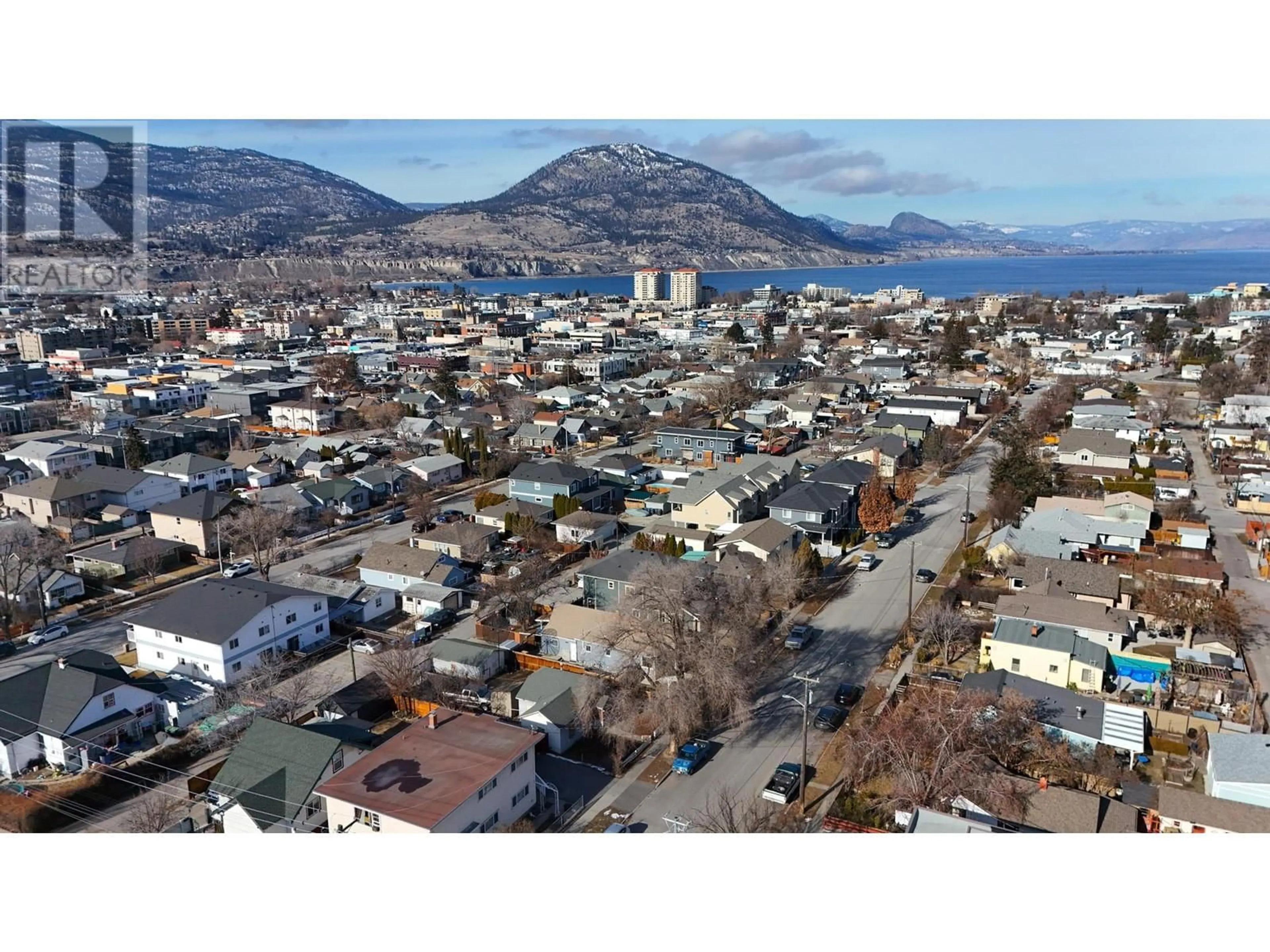 A pic from outside/outdoor area/front of a property/back of a property/a pic from drone, mountain view for 677 PAPINEAU STREET, Penticton British Columbia V2A4X8