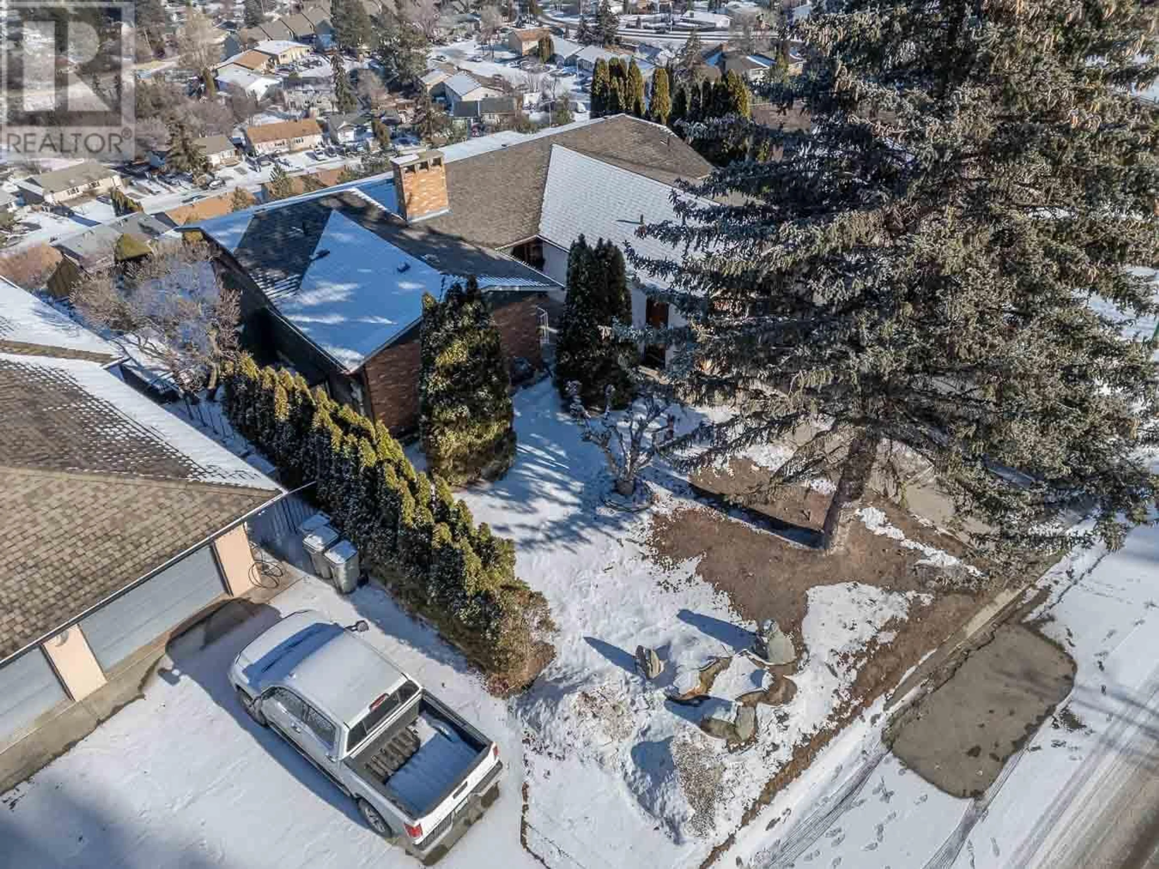 A pic from outside/outdoor area/front of a property/back of a property/a pic from drone, street for 396 Gleneagles Drive, Kamloops British Columbia V2E1Z4