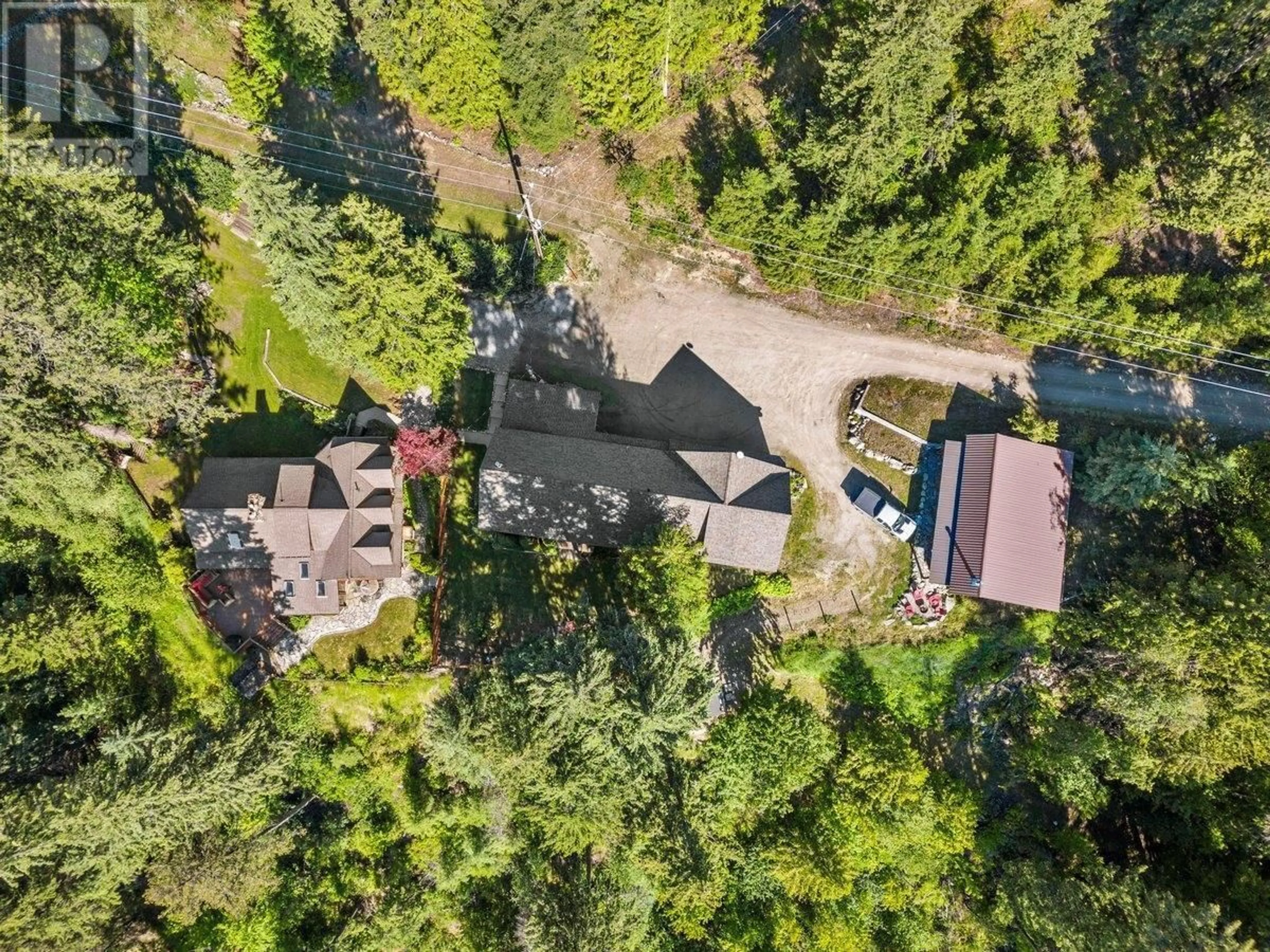 A pic from outside/outdoor area/front of a property/back of a property/a pic from drone, forest/trees view for 4898 3A Highway, Beasley British Columbia V0G2G2