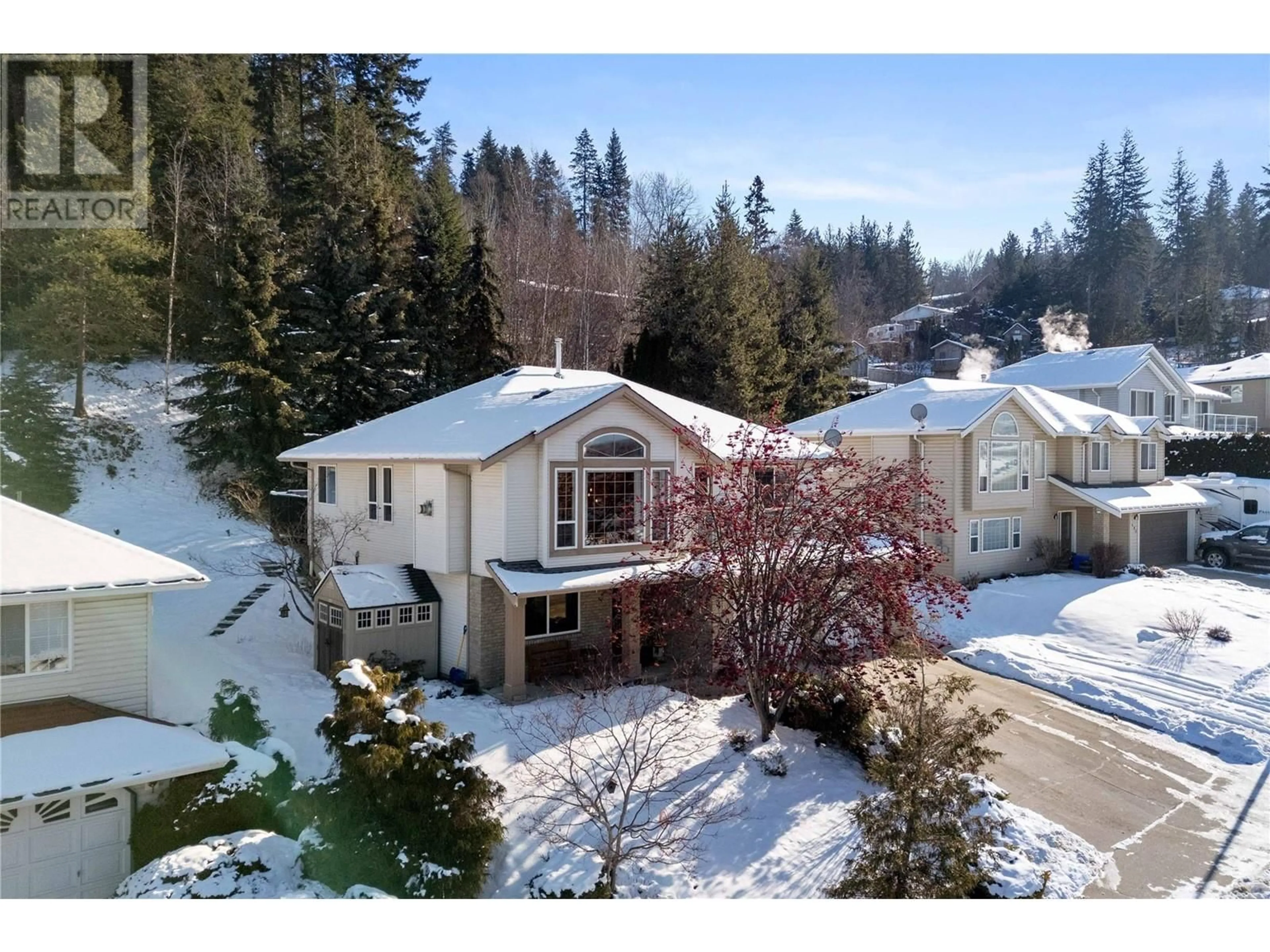 A pic from outside/outdoor area/front of a property/back of a property/a pic from drone, unknown for 450 17 Street SE, Salmon Arm British Columbia V1E1R7