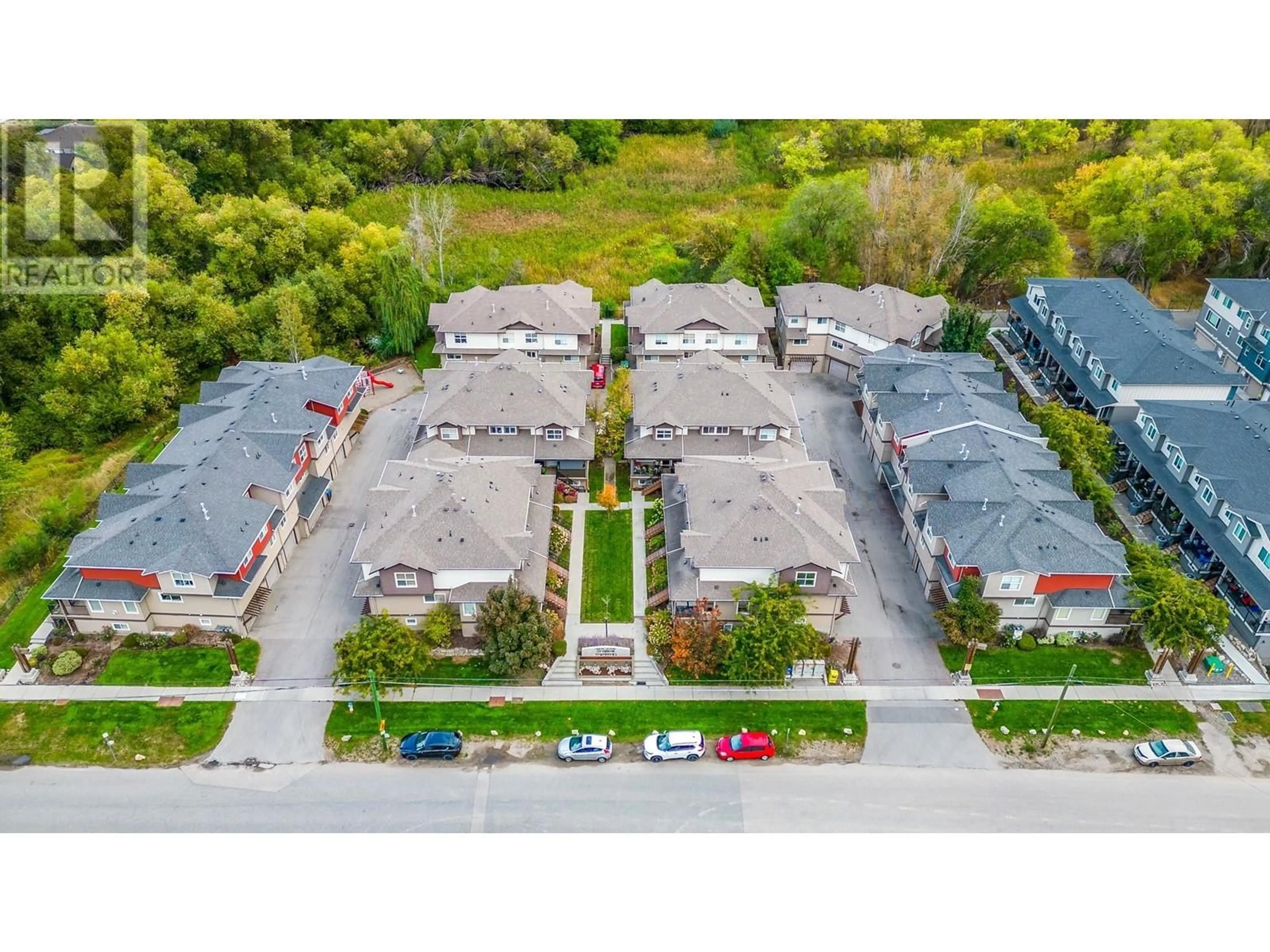 A pic from outside/outdoor area/front of a property/back of a property/a pic from drone, street for 1355 Findlay Road Unit# 122, Kelowna British Columbia V1X8B8