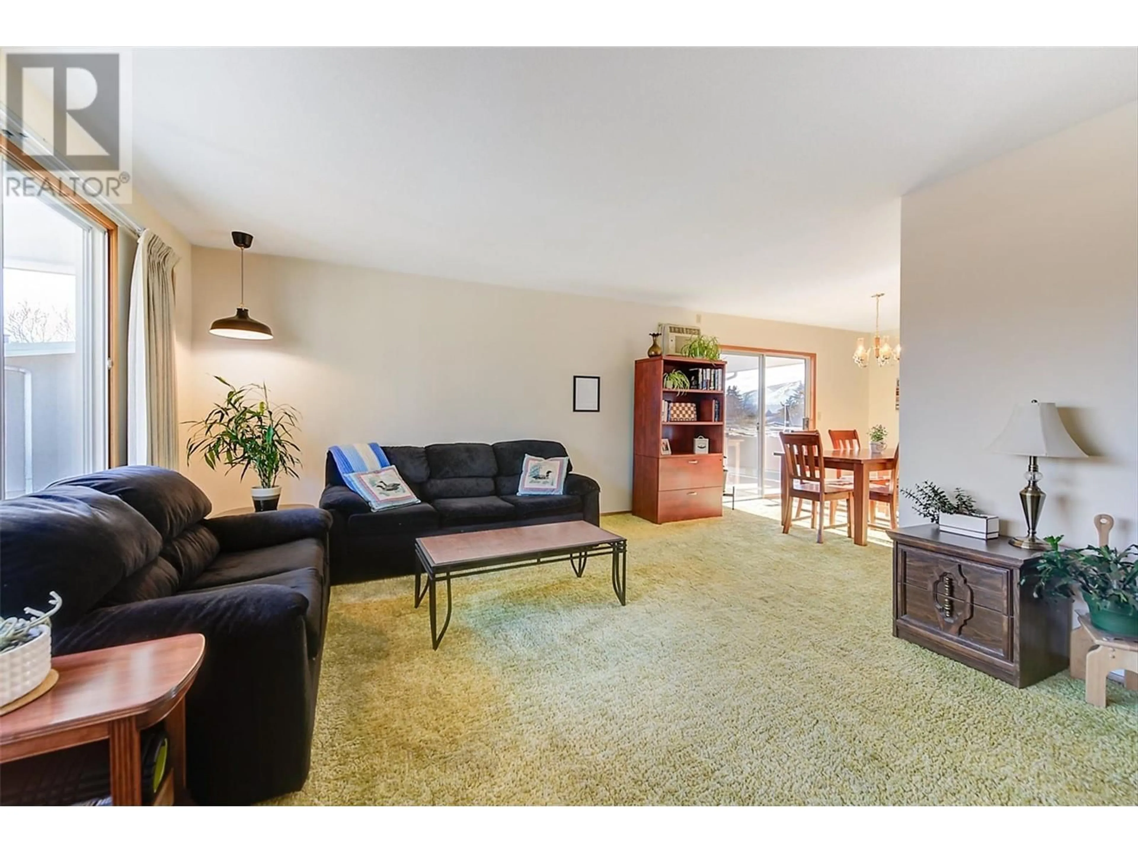 Living room with furniture, unknown for 2106 Kaslo Court, Kelowna British Columbia V1Y8C1