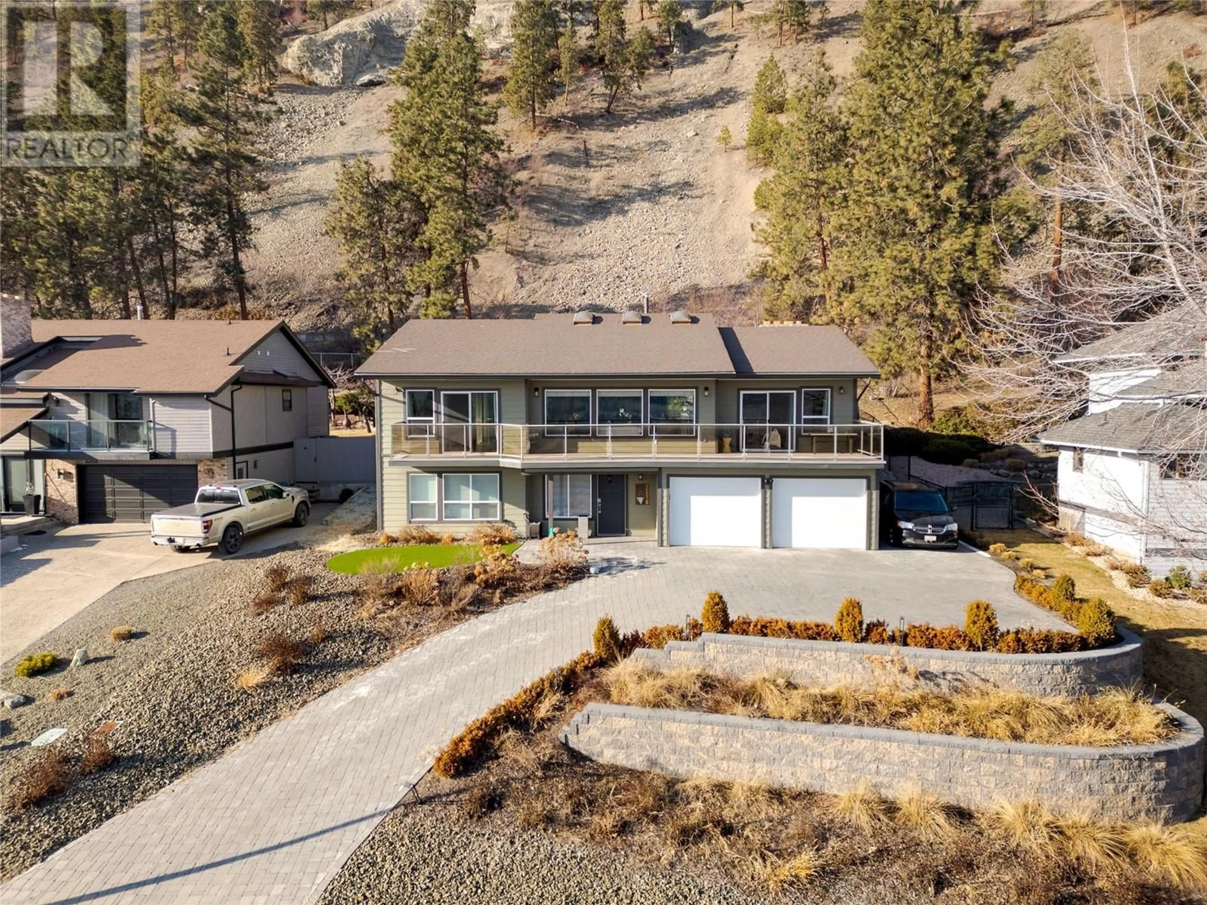 A pic from outside/outdoor area/front of a property/back of a property/a pic from drone, unknown for 2218 Omineca Place, Kelowna British Columbia V1V1H7