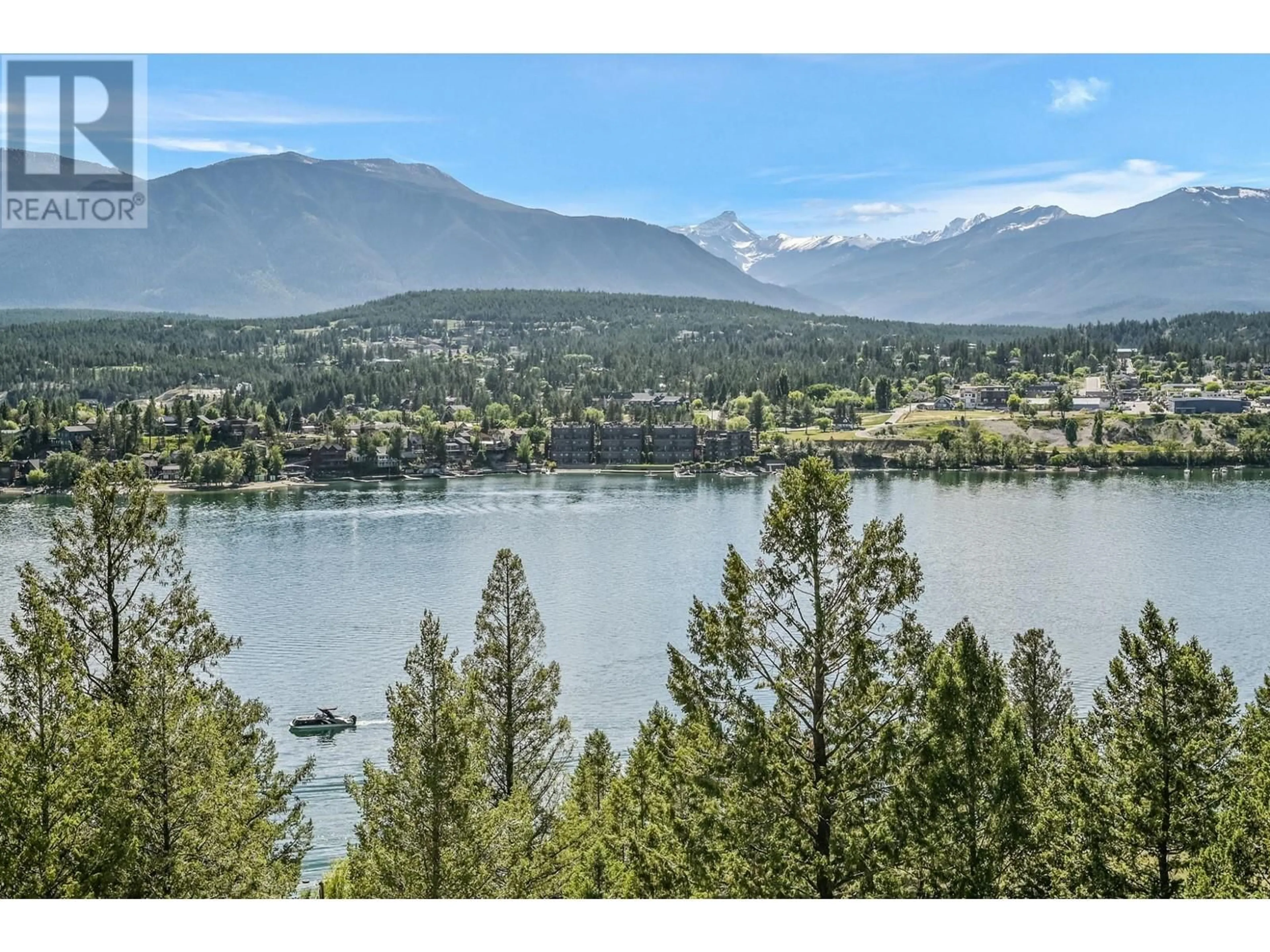 A pic from outside/outdoor area/front of a property/back of a property/a pic from drone, water/lake/river/ocean view for 717 LAKEVIEW Drive, Windermere British Columbia V0A1K3