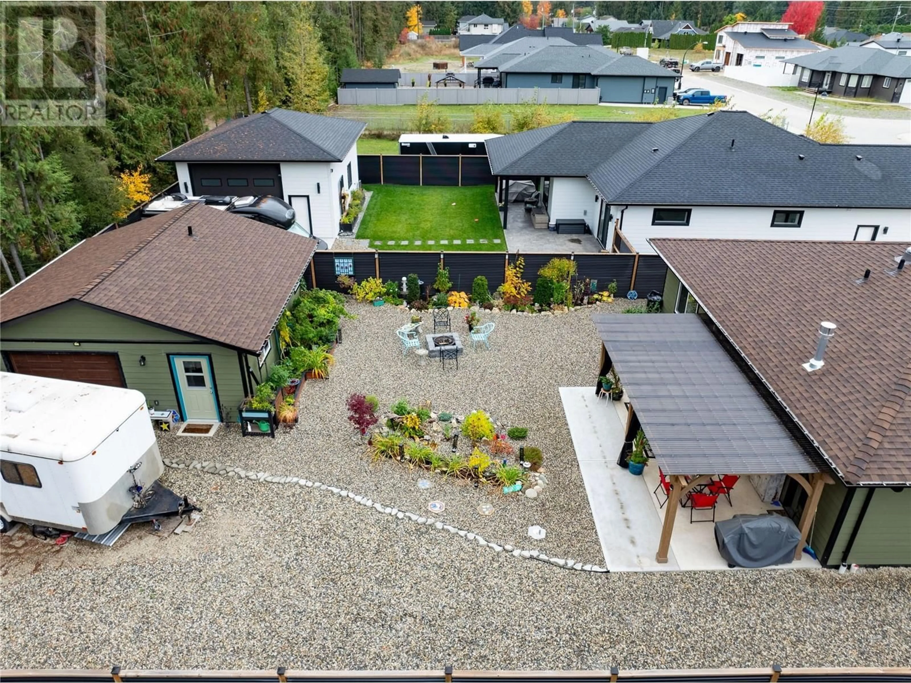 A pic from outside/outdoor area/front of a property/back of a property/a pic from drone, street for 1009 Hemlock Crescent N, Sicamous British Columbia V0E2V1