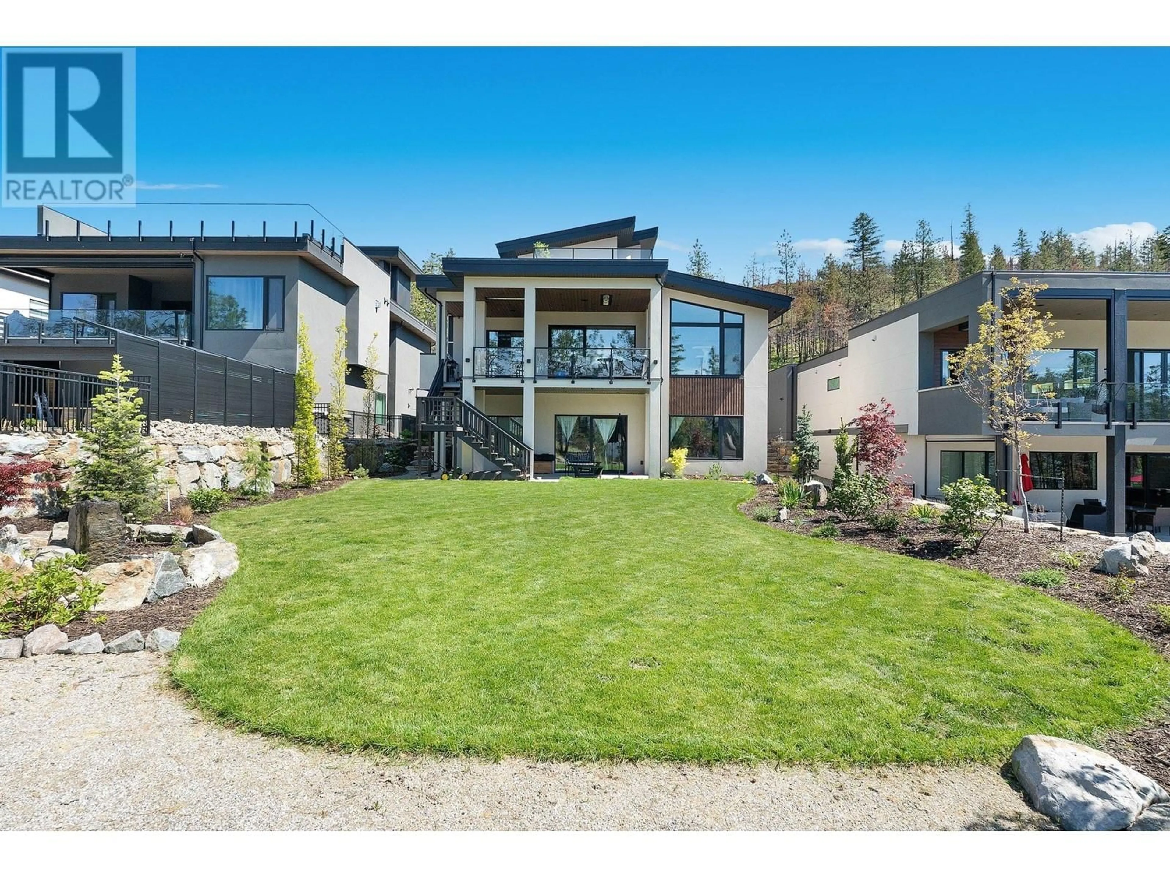 A pic from outside/outdoor area/front of a property/back of a property/a pic from drone, mountain view for 10138 BEACON HILL DRIVE, Lake Country British Columbia V4V0A9