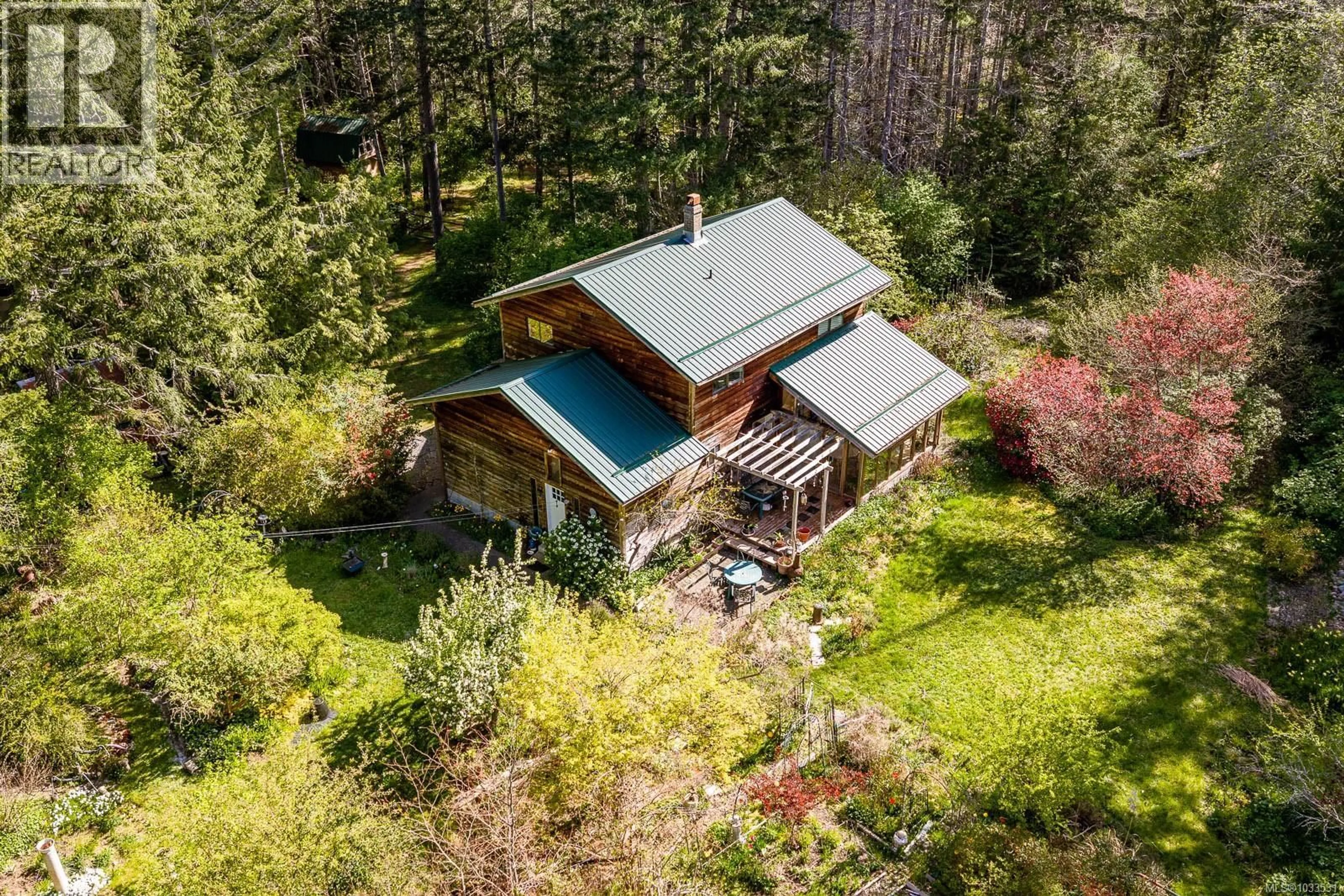 A pic from outside/outdoor area/front of a property/back of a property/a pic from drone, unknown for 875 CARMICHAEL ROAD, Hornby Island British Columbia V0R1Z0