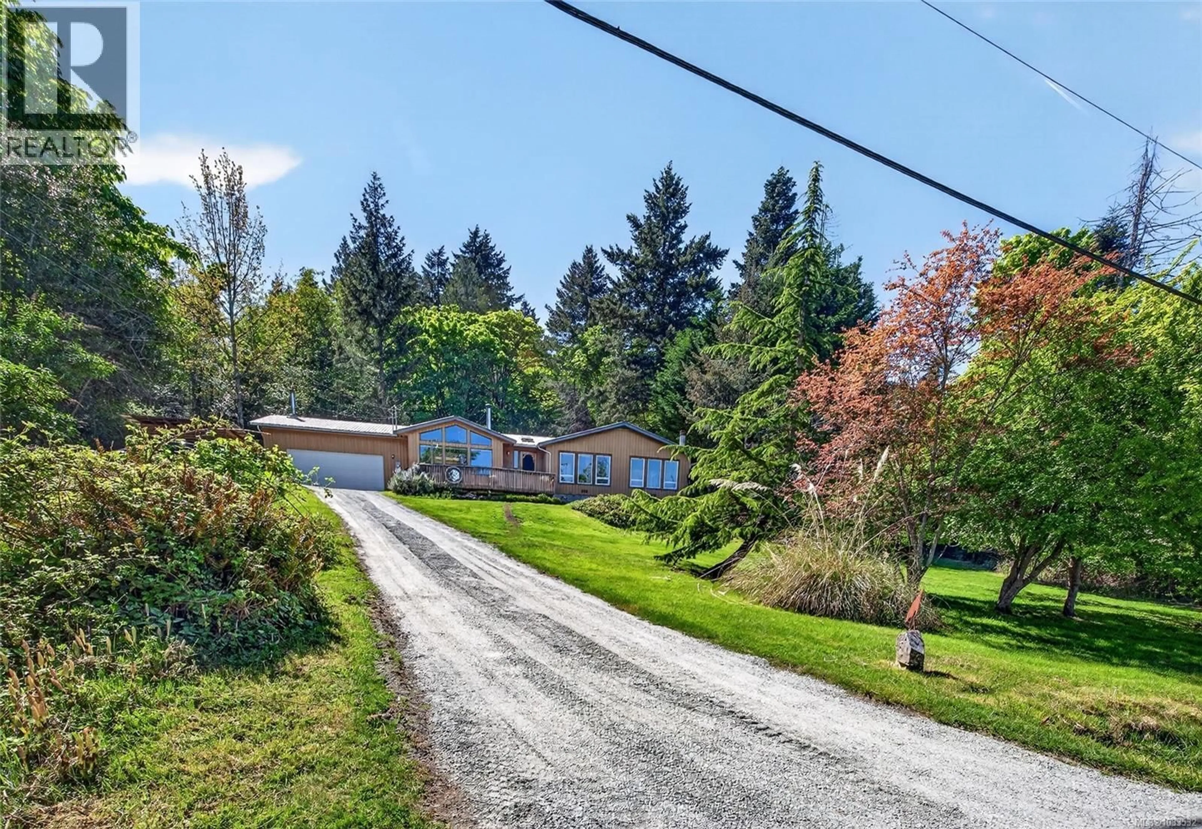 A pic from outside/outdoor area/front of a property/back of a property/a pic from drone, street for 251 PRICE ROAD, Salt Spring British Columbia V8K2E9
