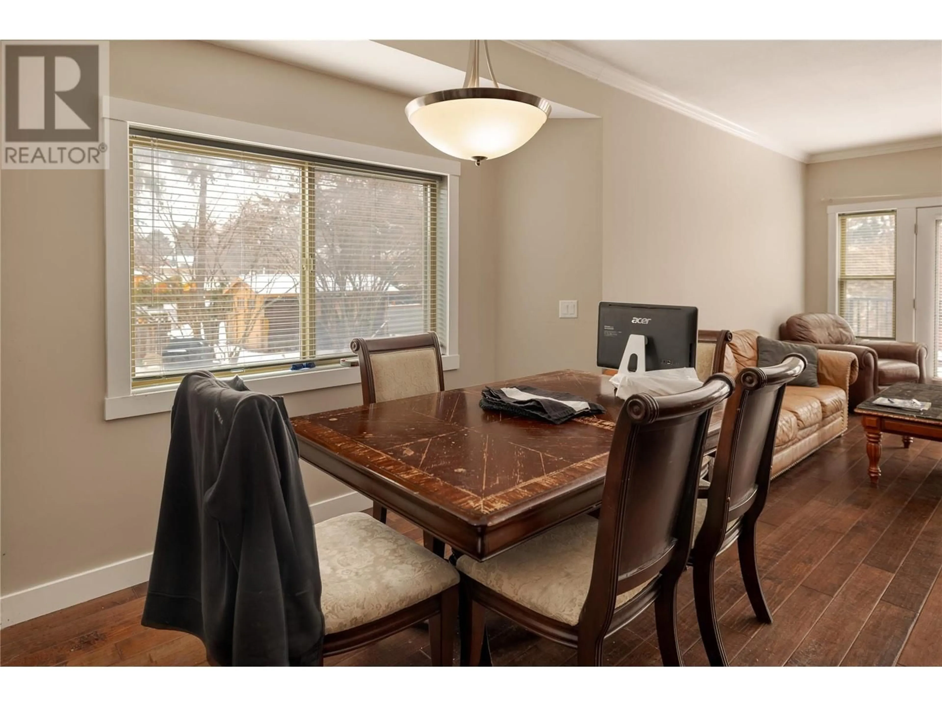 Dining room, wood/laminate floor for 10392 Bottom Wood Lake Road Unit# A, Lake Country British Columbia V4V1T9