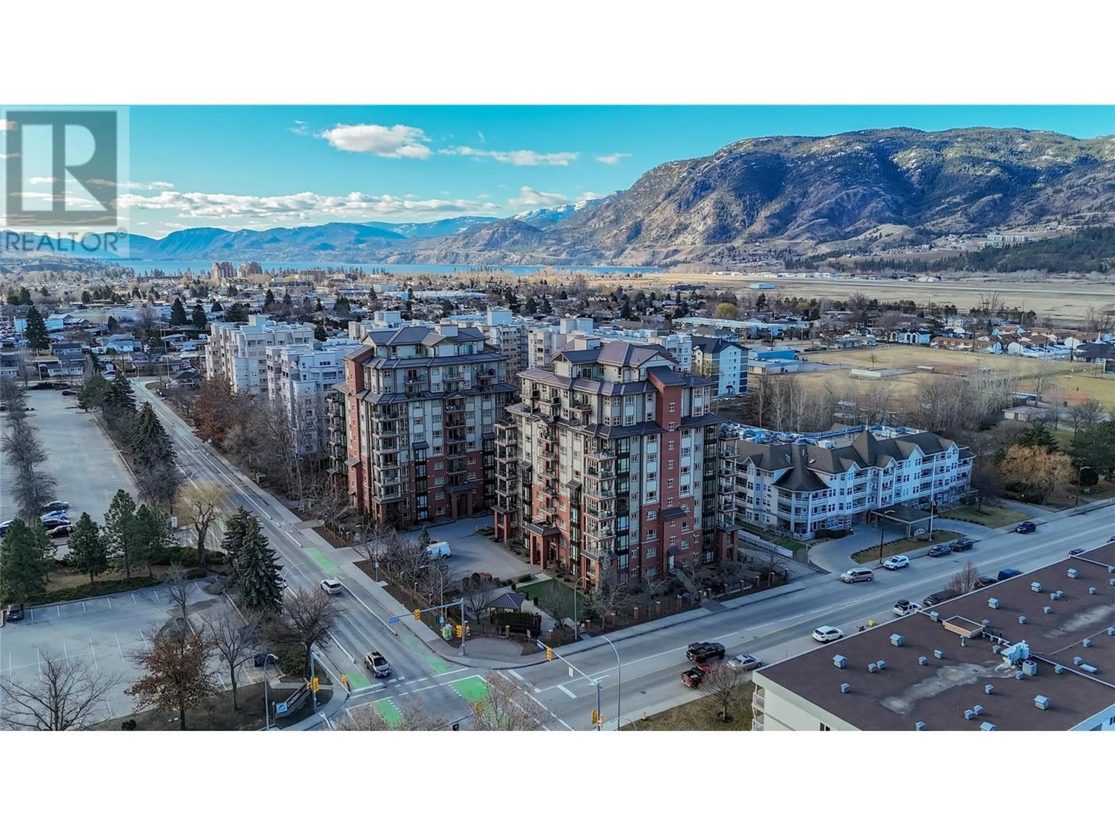 A pic from outside/outdoor area/front of a property/back of a property/a pic from drone, mountain view for 506 - 2113 ATKINSON STREET, Penticton British Columbia V2A8R5