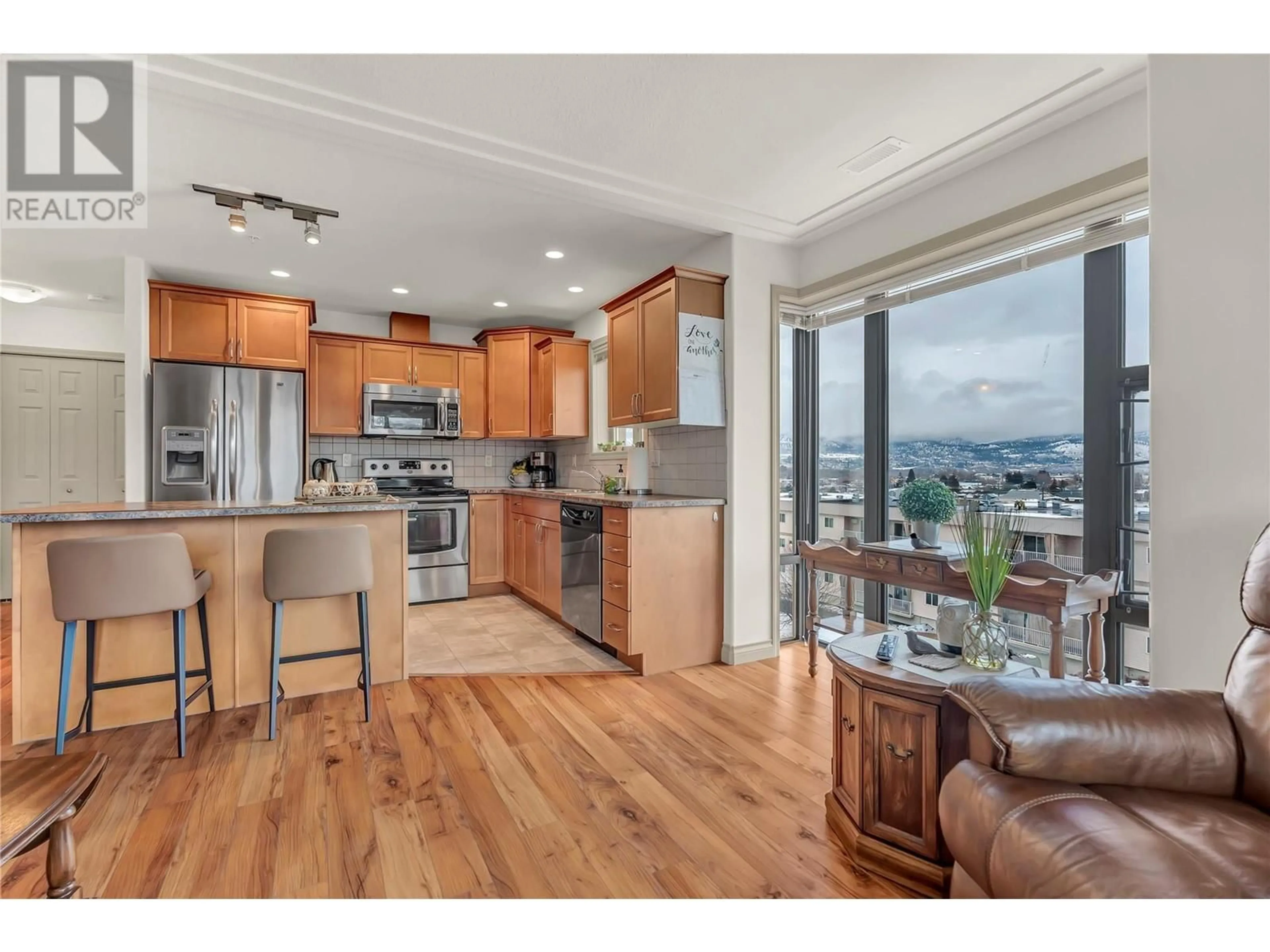 Open concept kitchen, wood/laminate floor for 506 - 2113 ATKINSON STREET, Penticton British Columbia V2A8R5