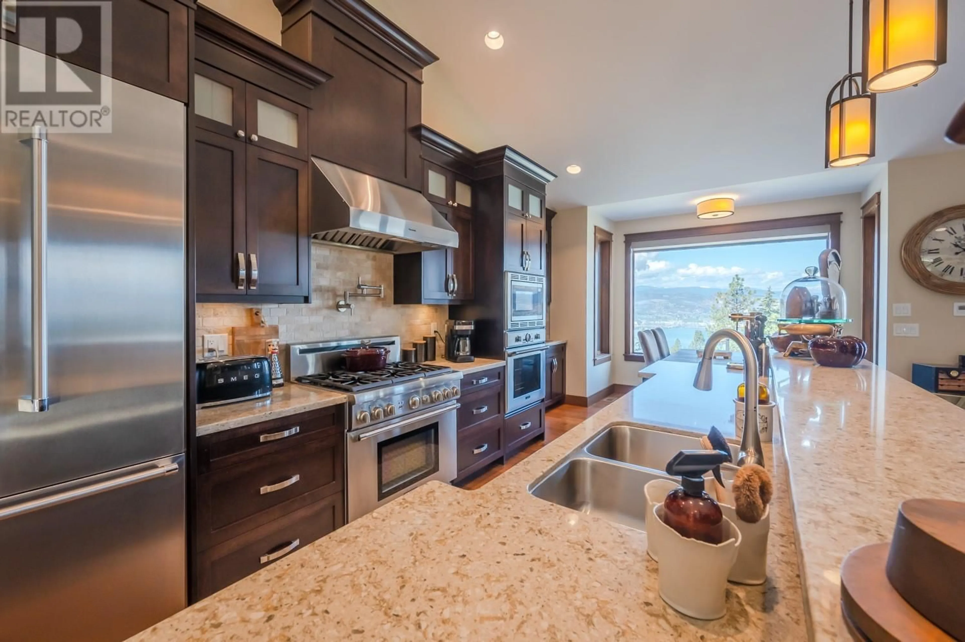 Open concept kitchen, ceramic/tile floor for 136 Flagstone Rise, Naramata British Columbia V0H1N1