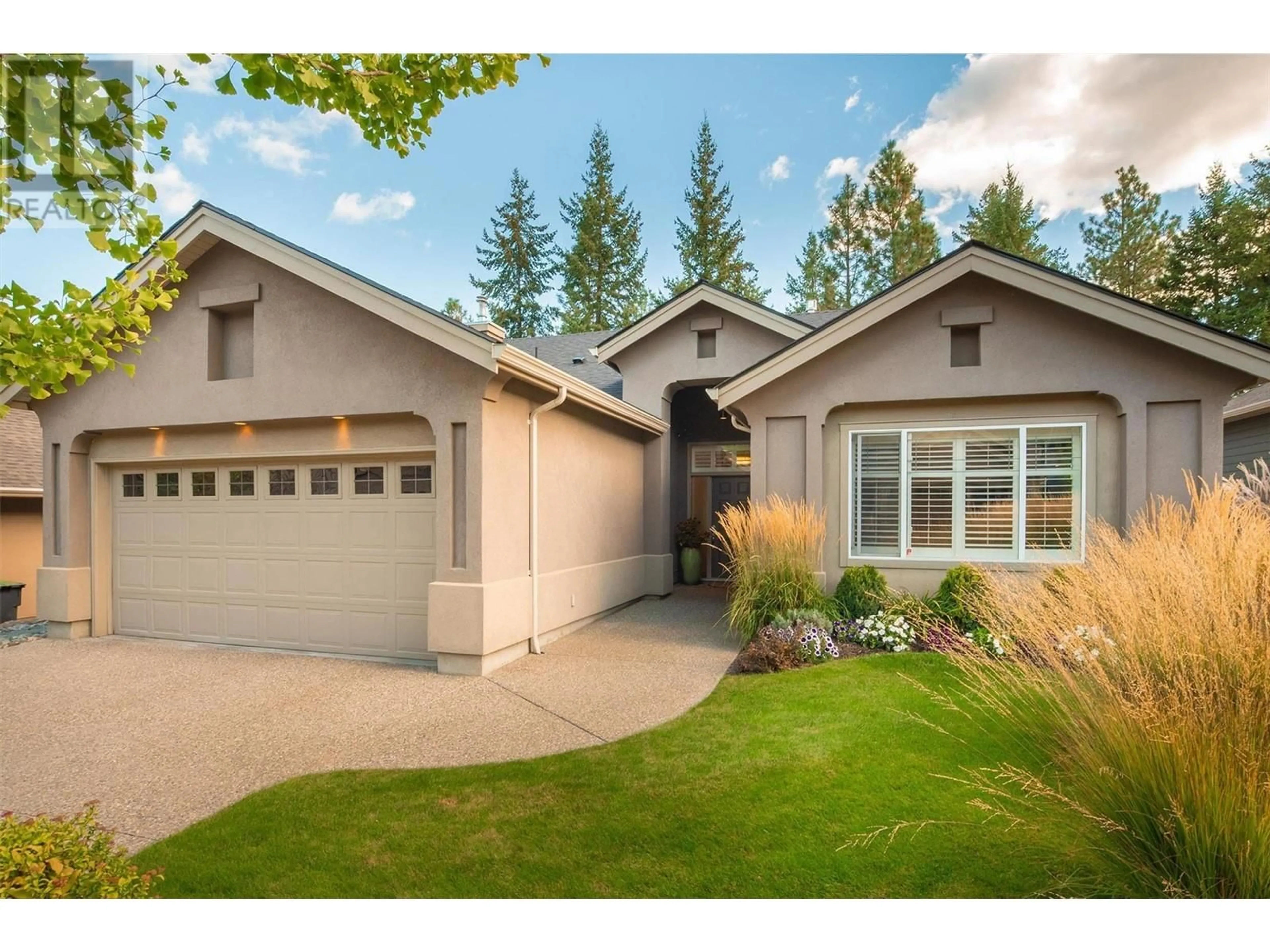 Home with vinyl exterior material, street for 4588 Gallaghers Edgewood Drive, Kelowna British Columbia V1W5B7