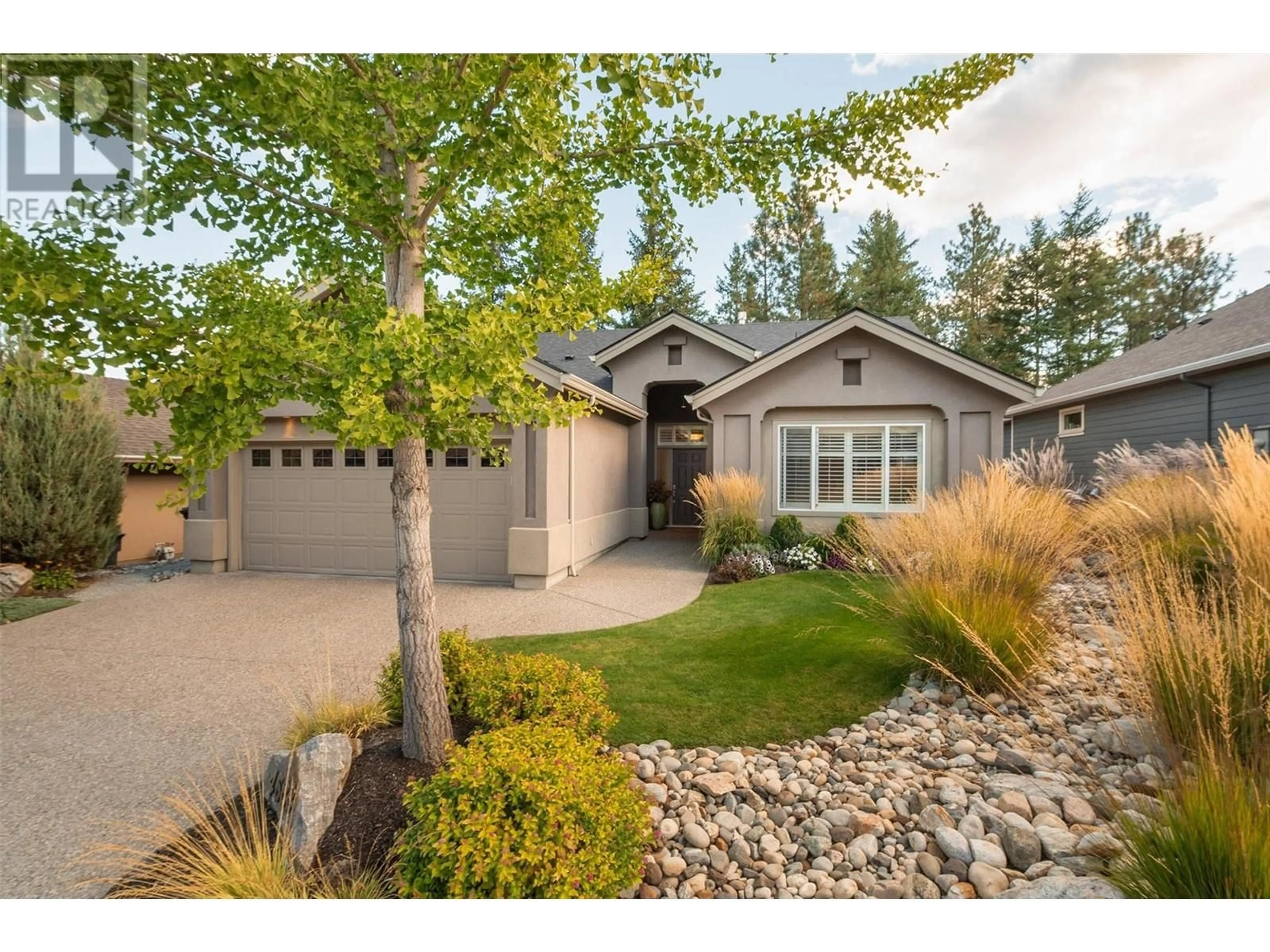 Home with vinyl exterior material, street for 4588 Gallaghers Edgewood Drive, Kelowna British Columbia V1W5B7