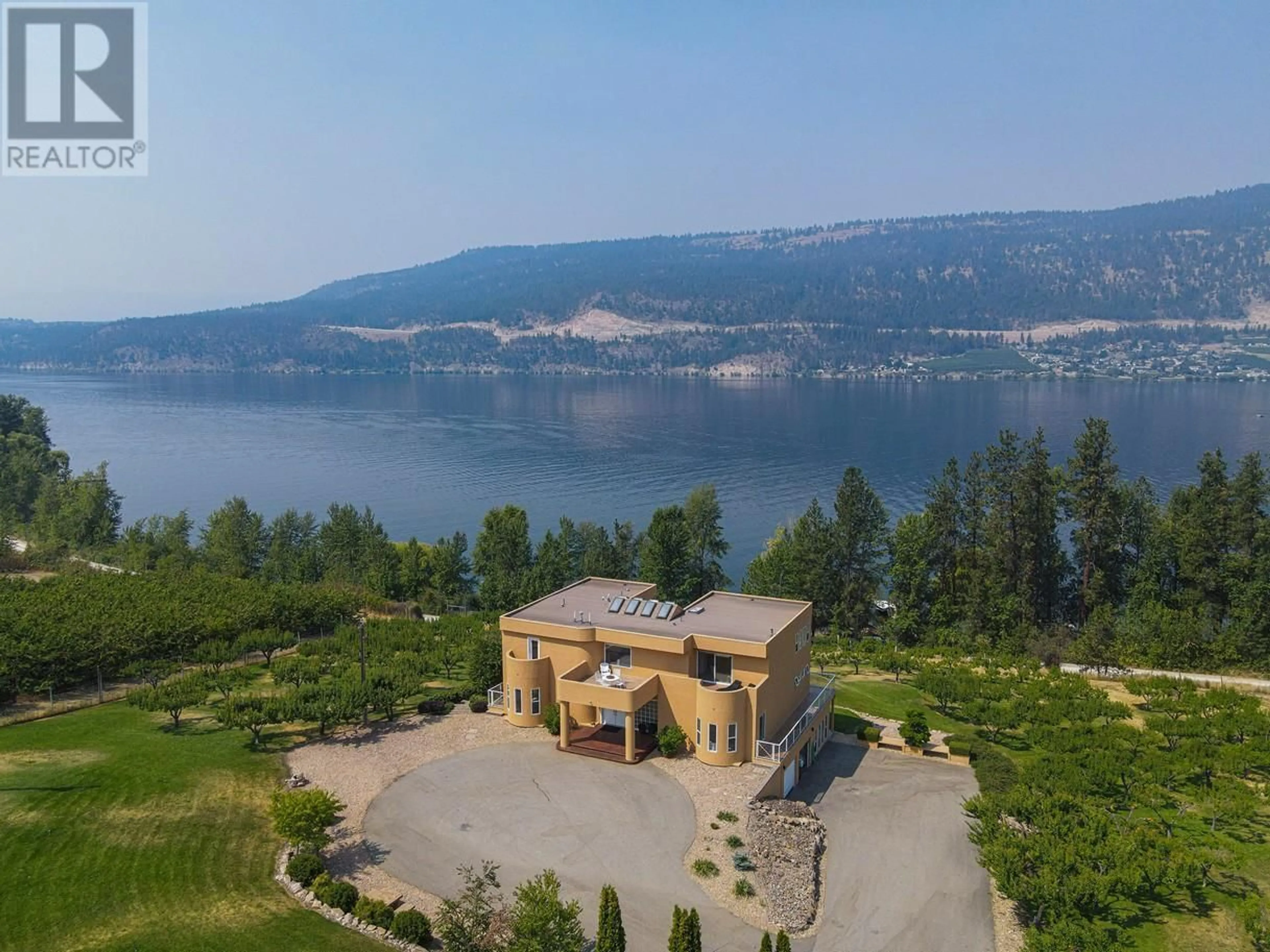 A pic from outside/outdoor area/front of a property/back of a property/a pic from drone, water/lake/river/ocean view for 14752 OYAMA ROAD, Lake Country British Columbia V4V2C6