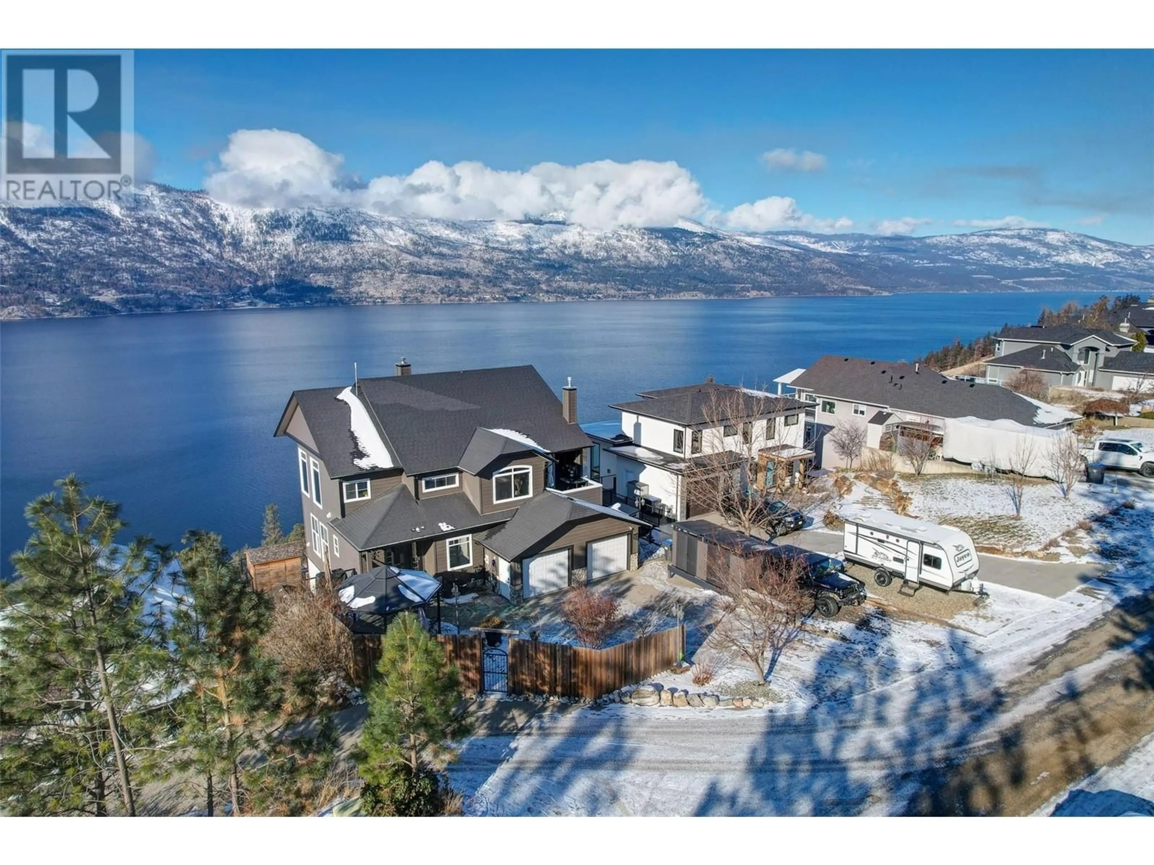 A pic from outside/outdoor area/front of a property/back of a property/a pic from drone, water/lake/river/ocean view for 10340 Nighthawk Road, Lake Country British Columbia V4V2K7