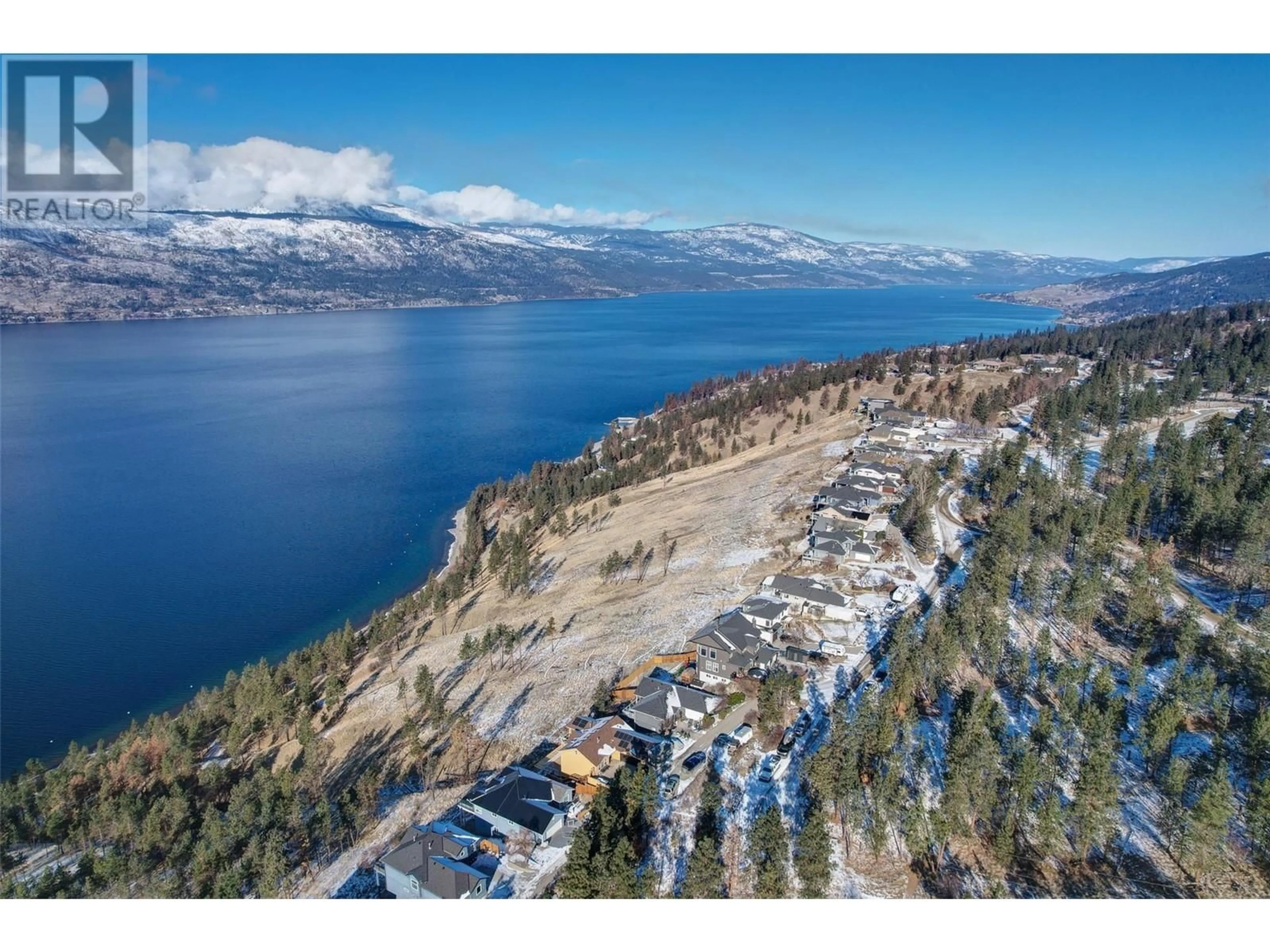 A pic from outside/outdoor area/front of a property/back of a property/a pic from drone, water/lake/river/ocean view for 10340 Nighthawk Road, Lake Country British Columbia V4V2K7