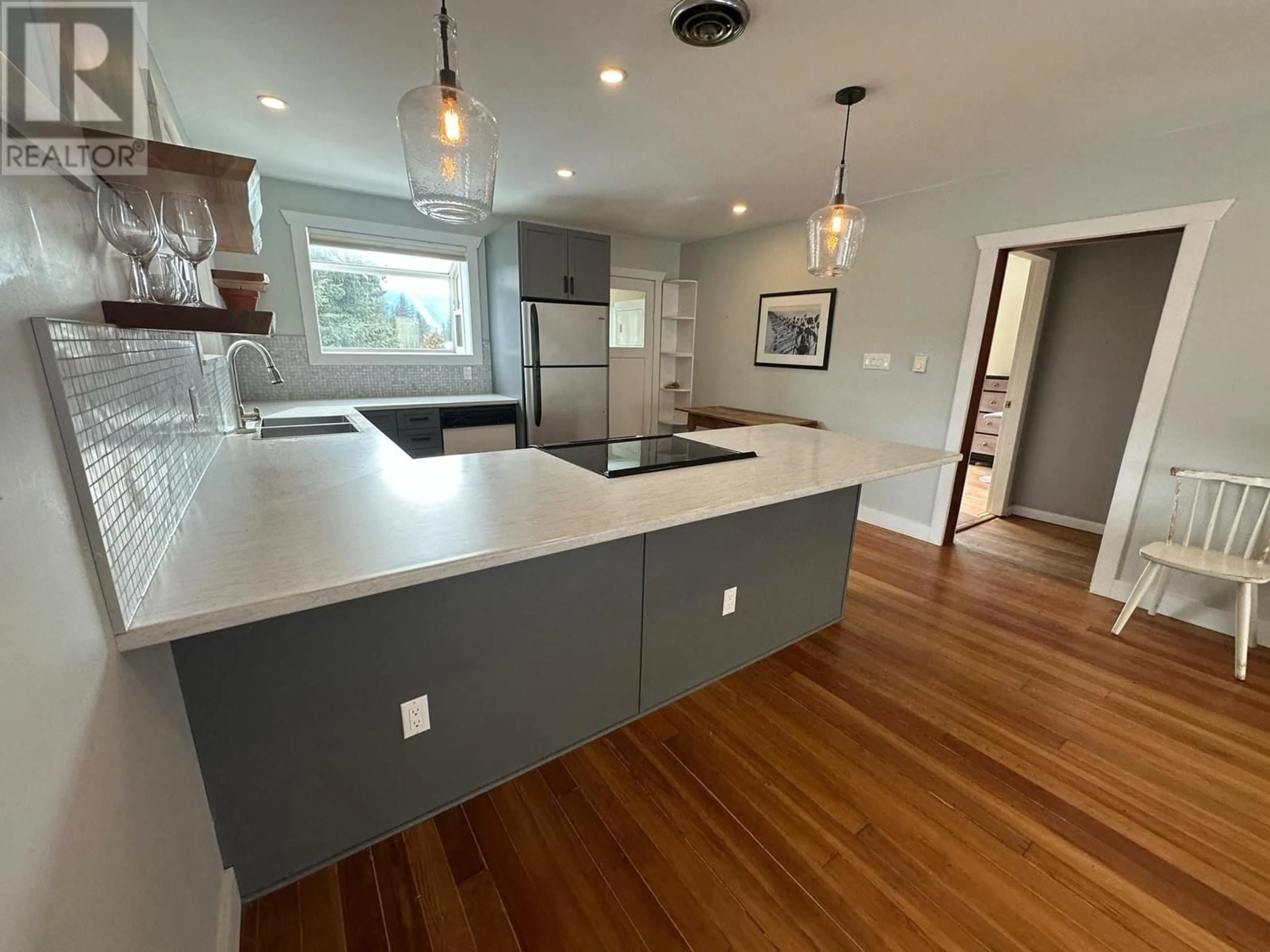 Open concept kitchen, wood/laminate floor for 3190 MURRAY ROAD, South Slocan British Columbia V0G2G1