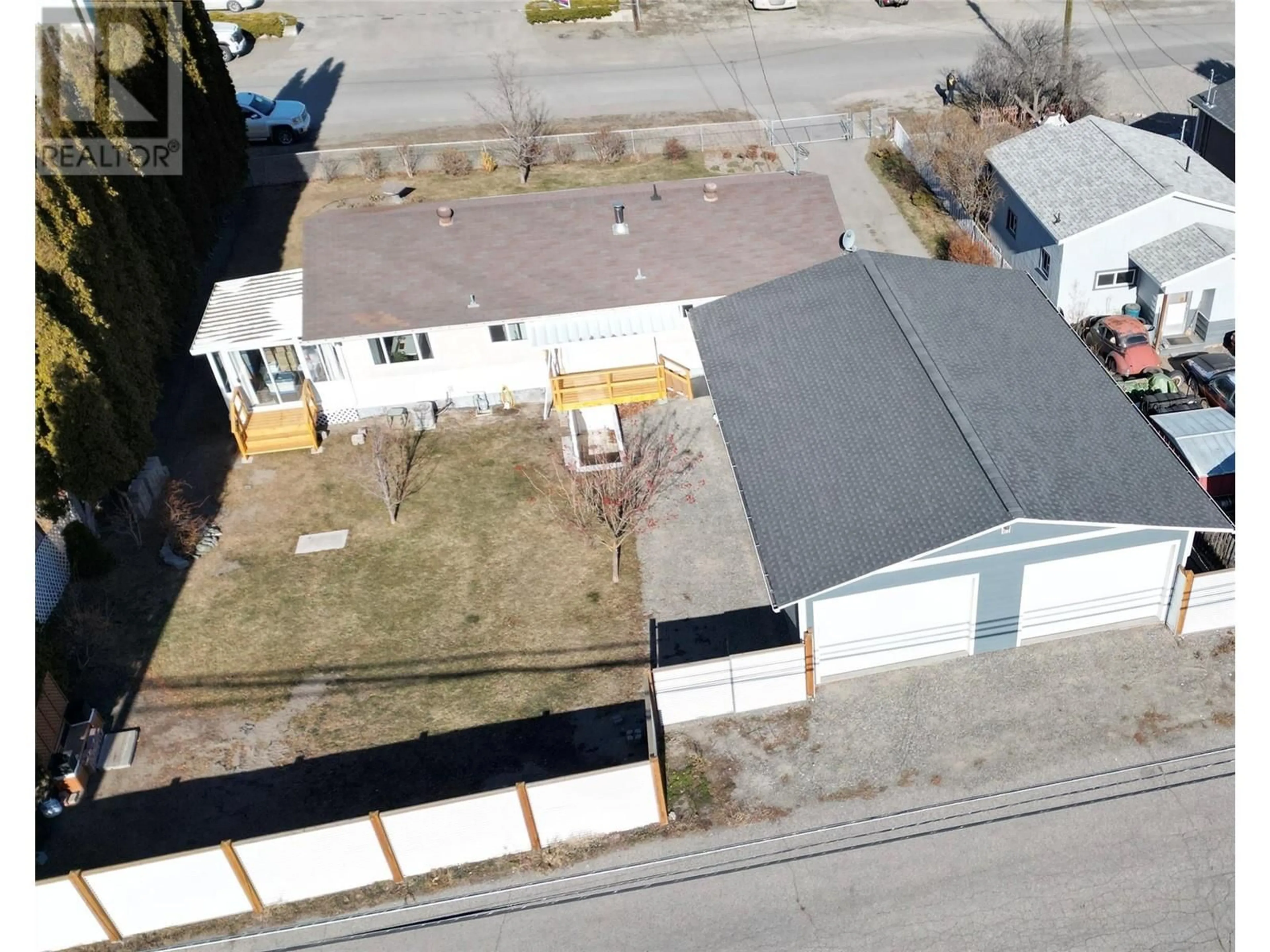 A pic from outside/outdoor area/front of a property/back of a property/a pic from drone, street for 715 6TH Avenue, Keremeos British Columbia V0X1N0