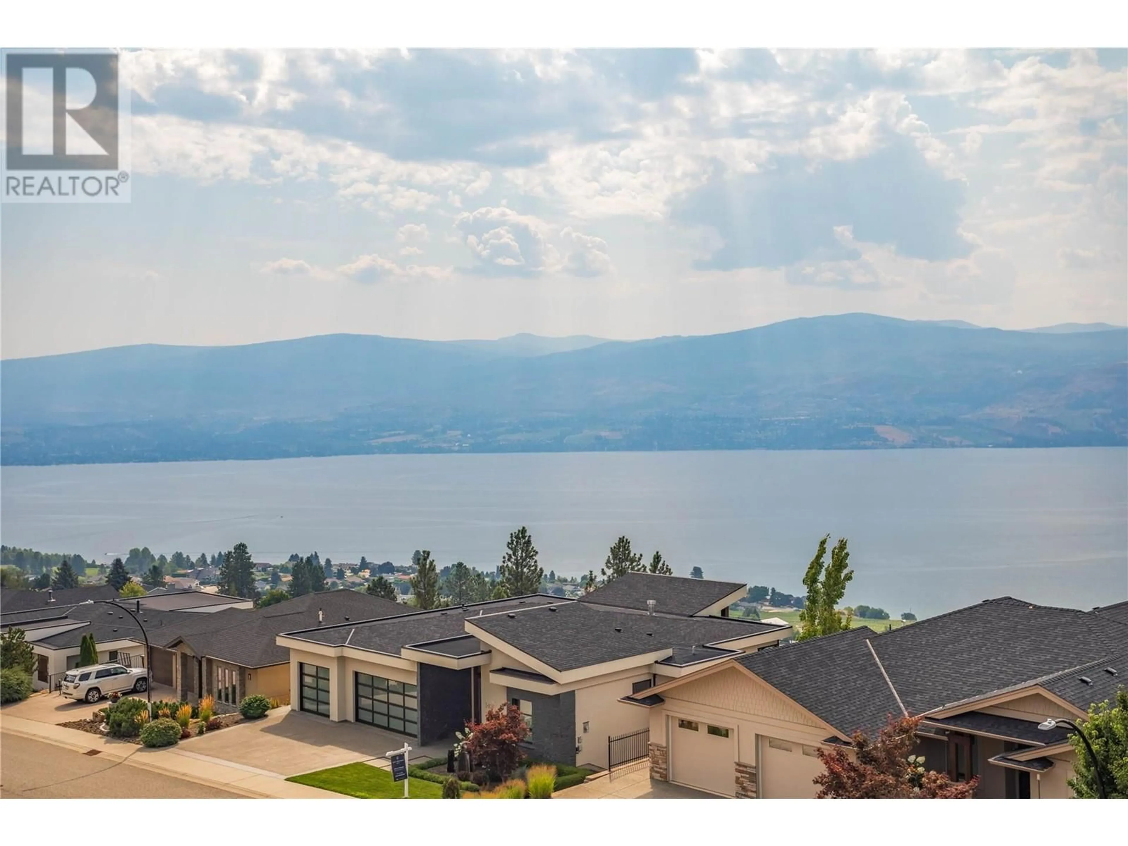 A pic from outside/outdoor area/front of a property/back of a property/a pic from drone, water/lake/river/ocean view for 1420 Pinot Noir Drive, West Kelowna British Columbia V4T3H9