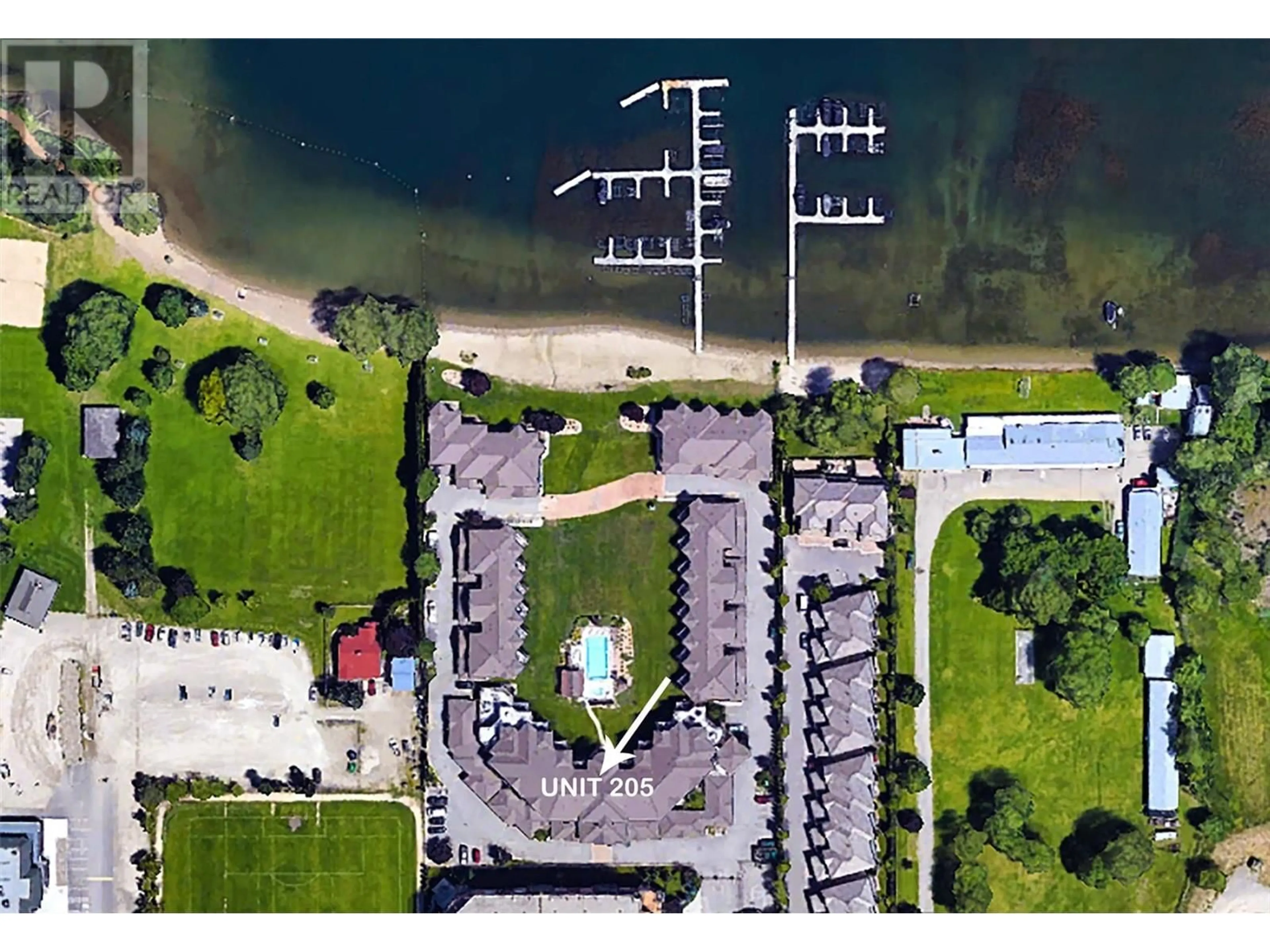 A pic from outside/outdoor area/front of a property/back of a property/a pic from drone, water/lake/river/ocean view for 205 - 3570 WOODSDALE ROAD, Lake Country British Columbia V4V1Y9