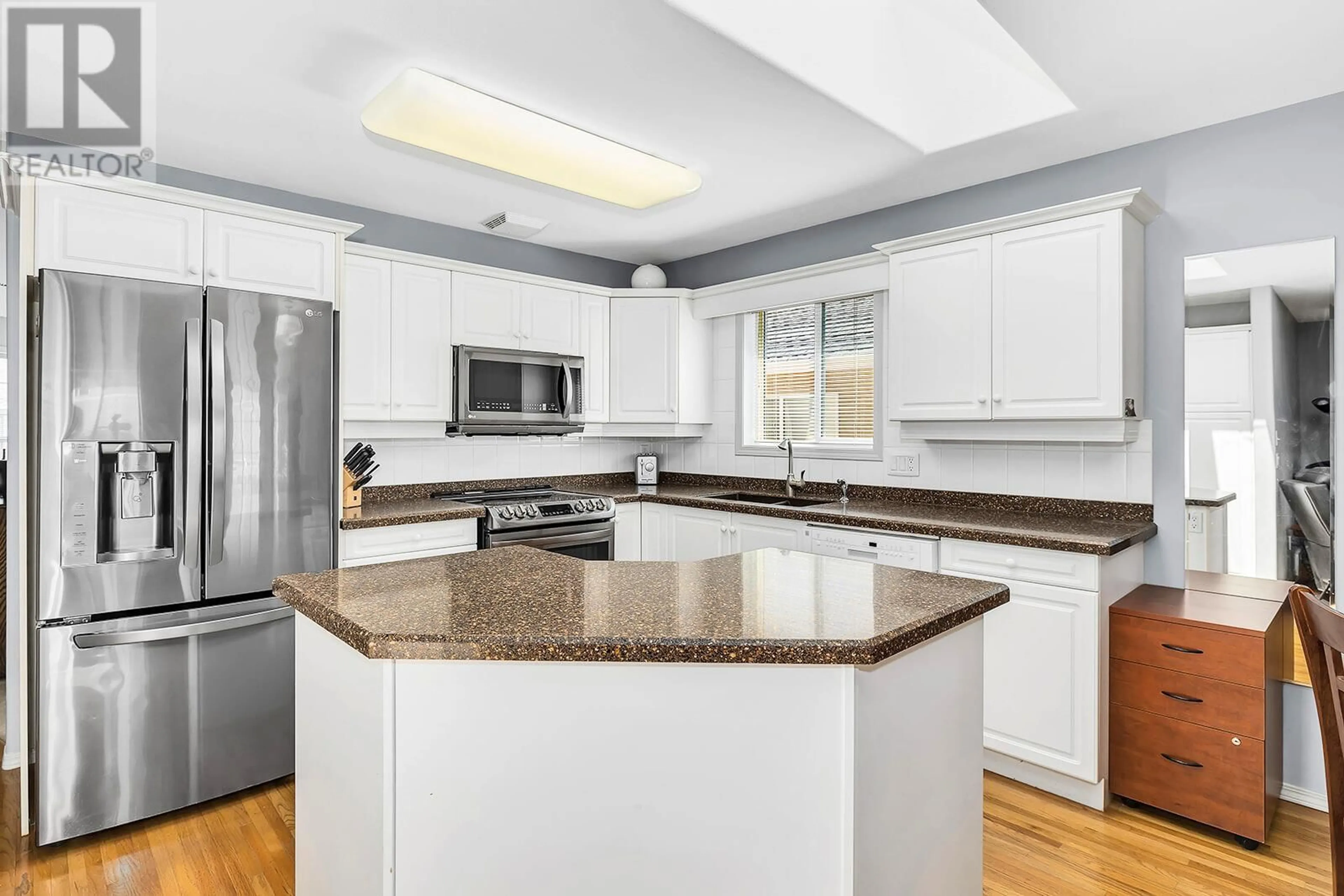 Open concept kitchen, ceramic/tile floor for 130 - 2250 LOUIE DRIVE, West Kelowna British Columbia V4T2M6