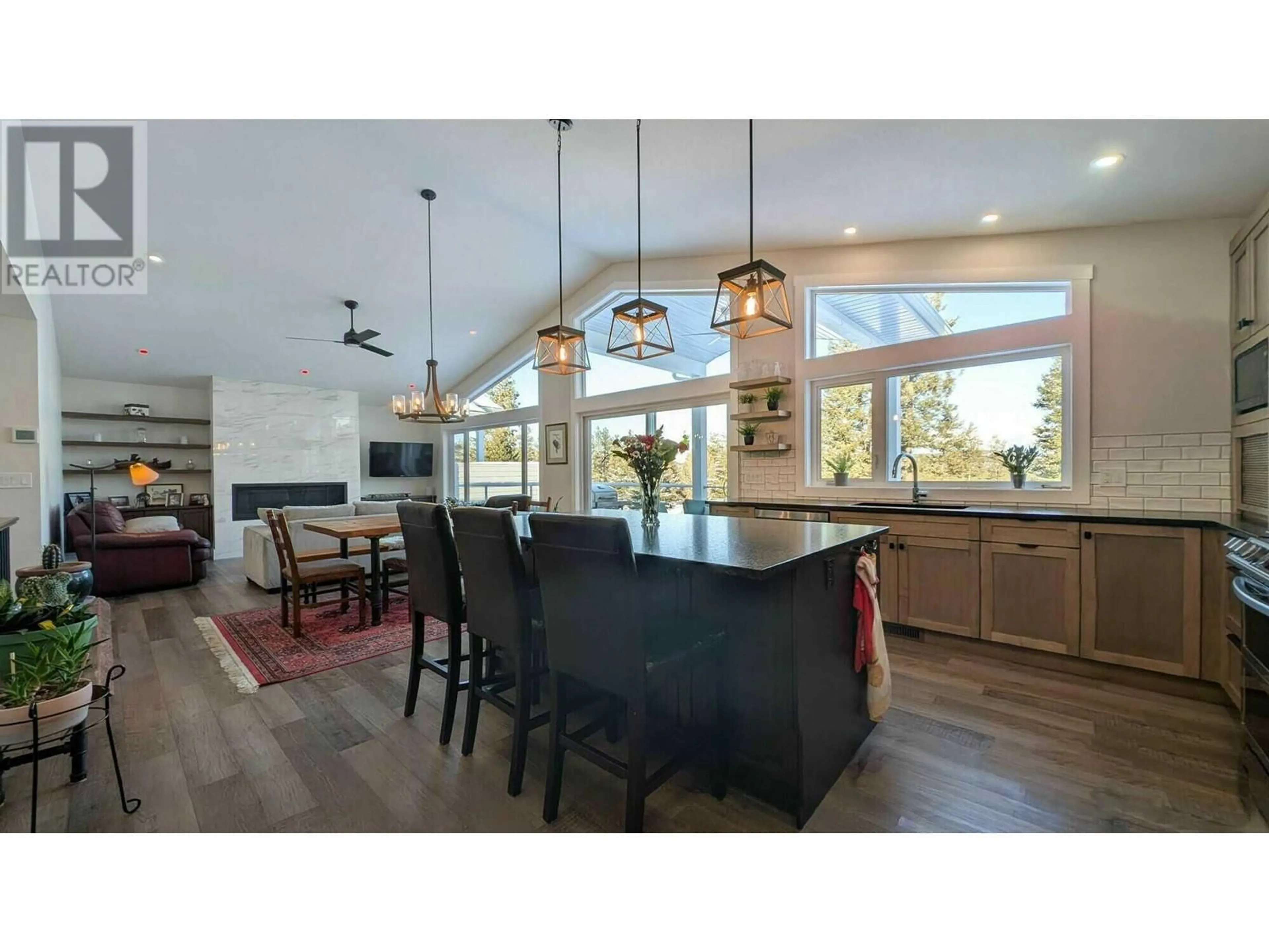 Open concept kitchen, wood/laminate floor for 328 Legacy Lookout, Cranbrook British Columbia V1C0E4