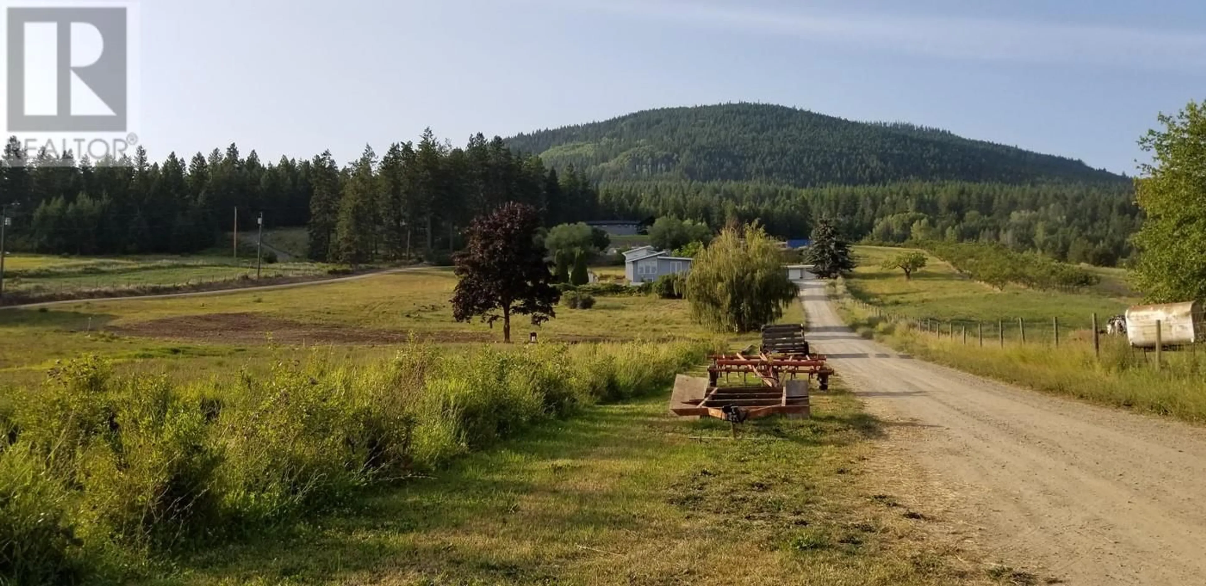 A pic from outside/outdoor area/front of a property/back of a property/a pic from drone, unknown for 2918 Highway 3, Erickson British Columbia V0B1G1