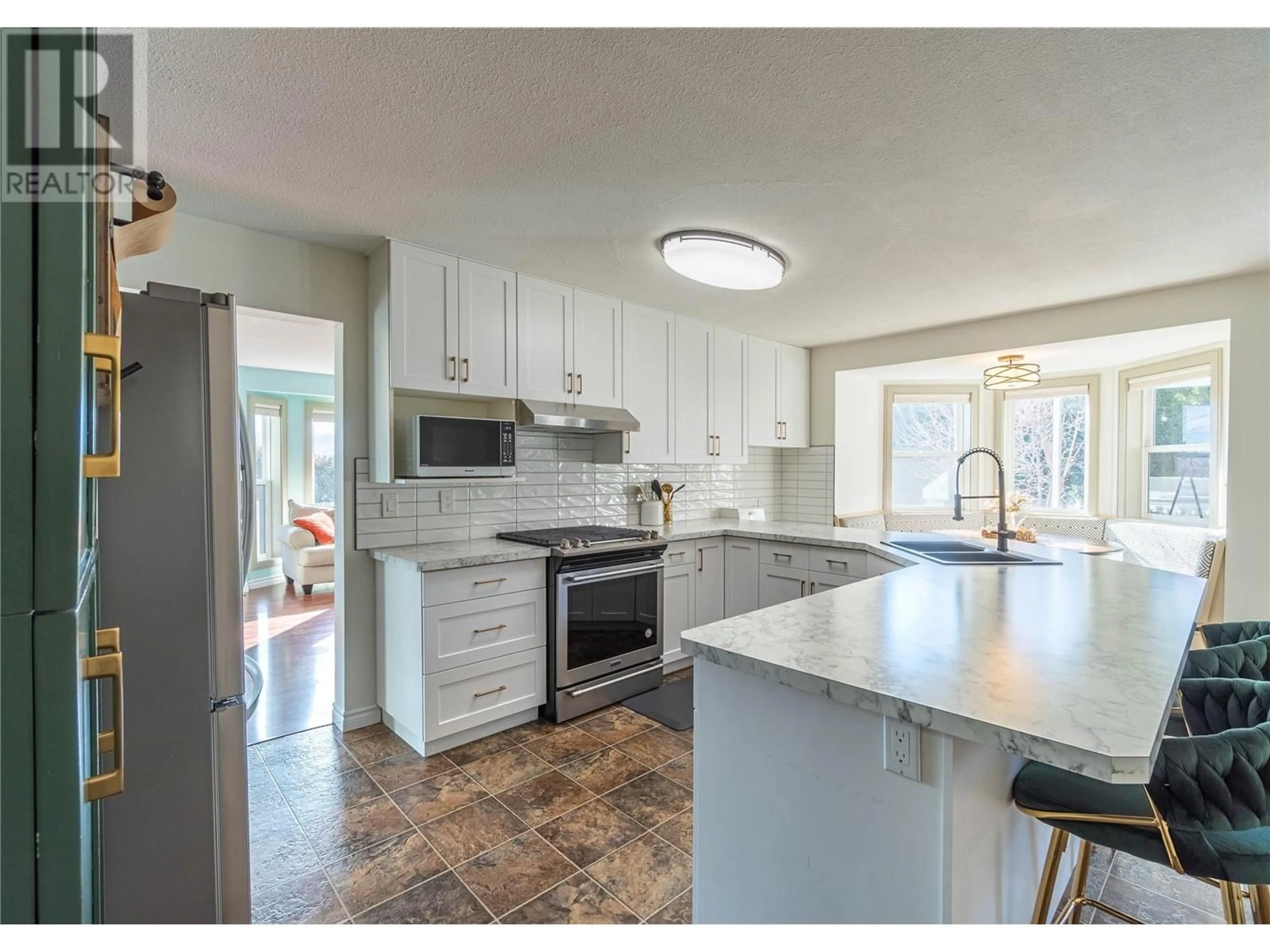 Open concept kitchen, ceramic/tile floor for 865 Alview Crescent, Kamloops British Columbia V2B6C5