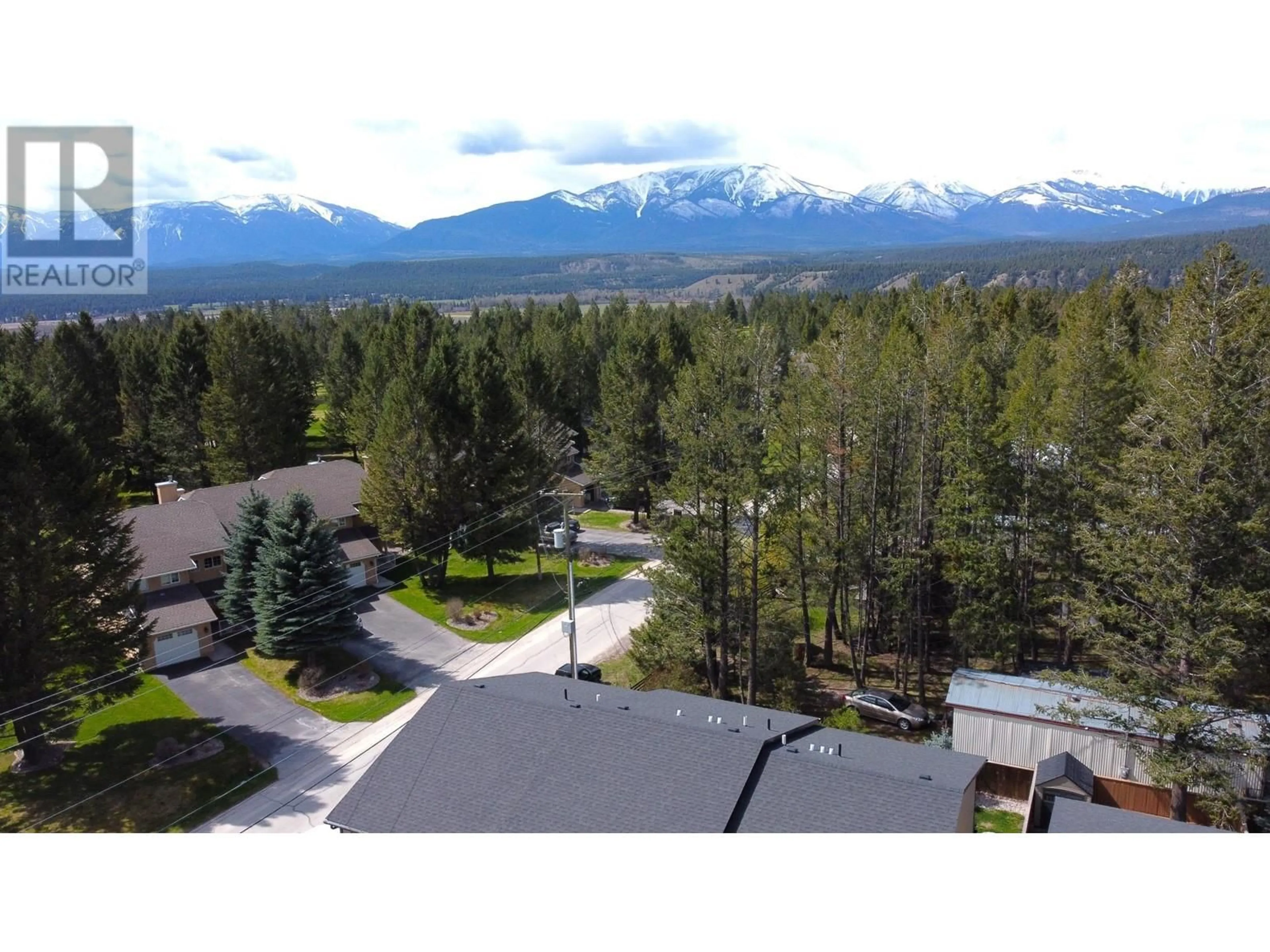 A pic from outside/outdoor area/front of a property/back of a property/a pic from drone, mountain view for 7581 PIONEER Avenue, Radium Hot Springs British Columbia V0A1M0